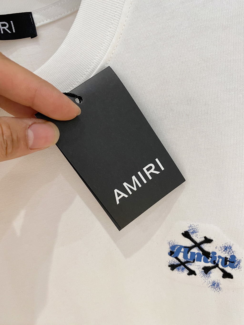 AMIRI Skull Crossbones Chest Graphic Crew Neck Short‑Sleeve T‑Shirt