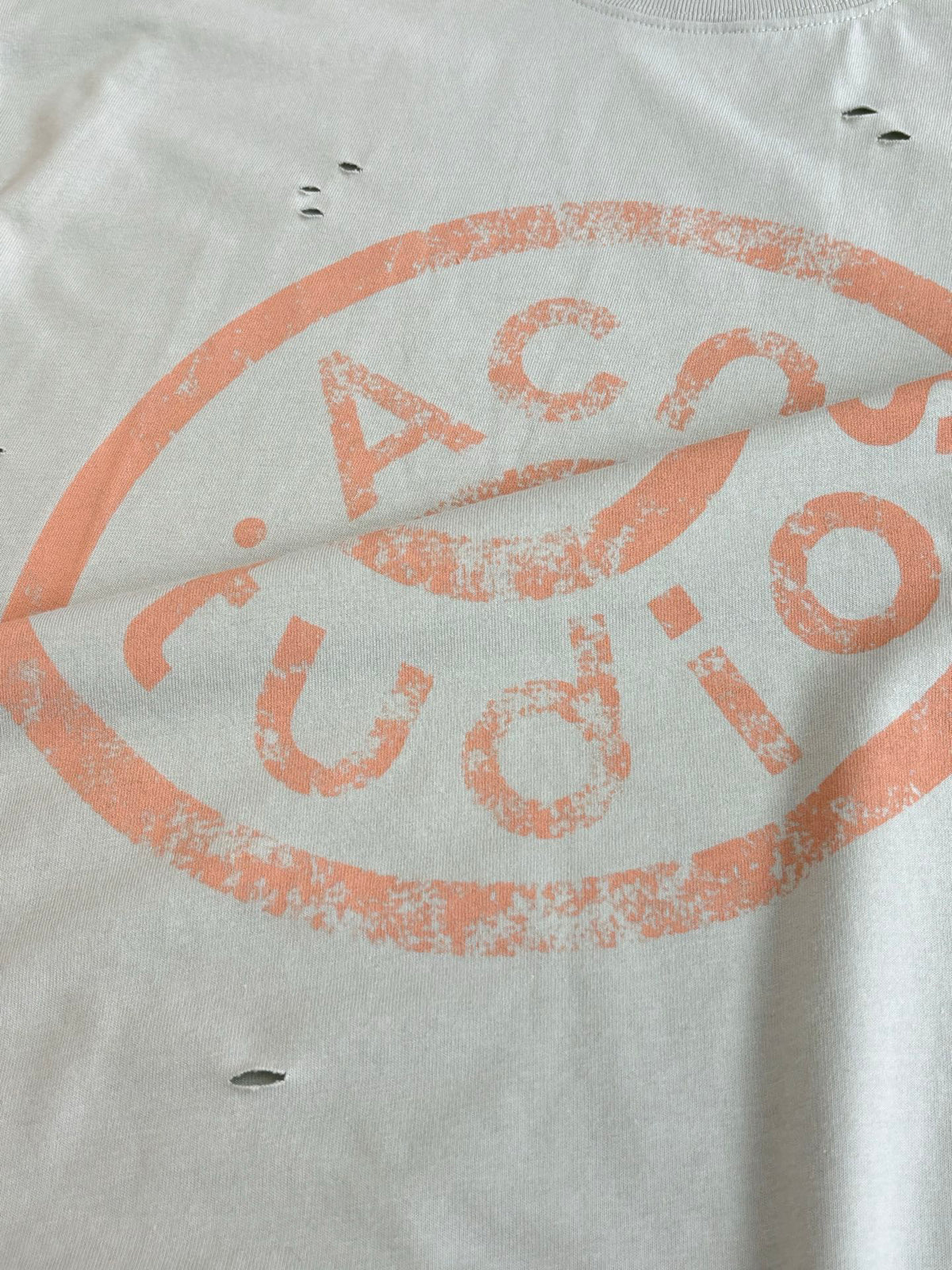 Acne Studios Distressed Circular‑Logo Oversized Short‑Sleeve T‑Shirt
