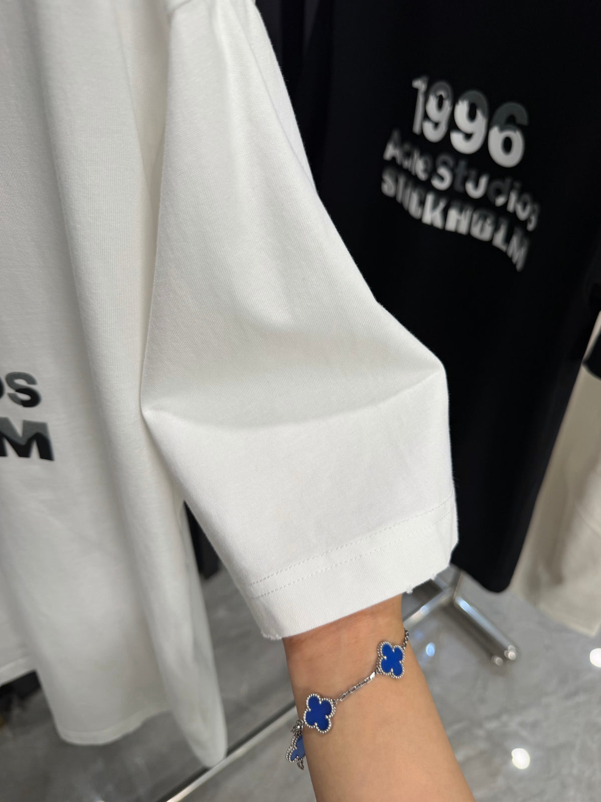 Acne Studios Stockholm 1996 Stacked‑Text Distressed‑Hem Oversized Crew‑Neck T‑Shirt