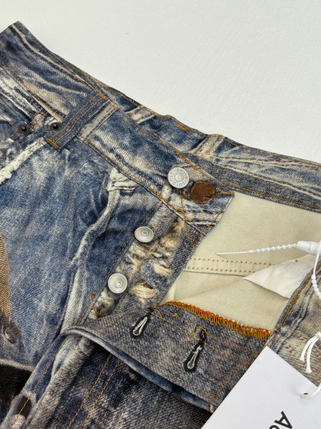 Acne Studios Graffiti‑Print Distressed Wide‑Leg Jeans