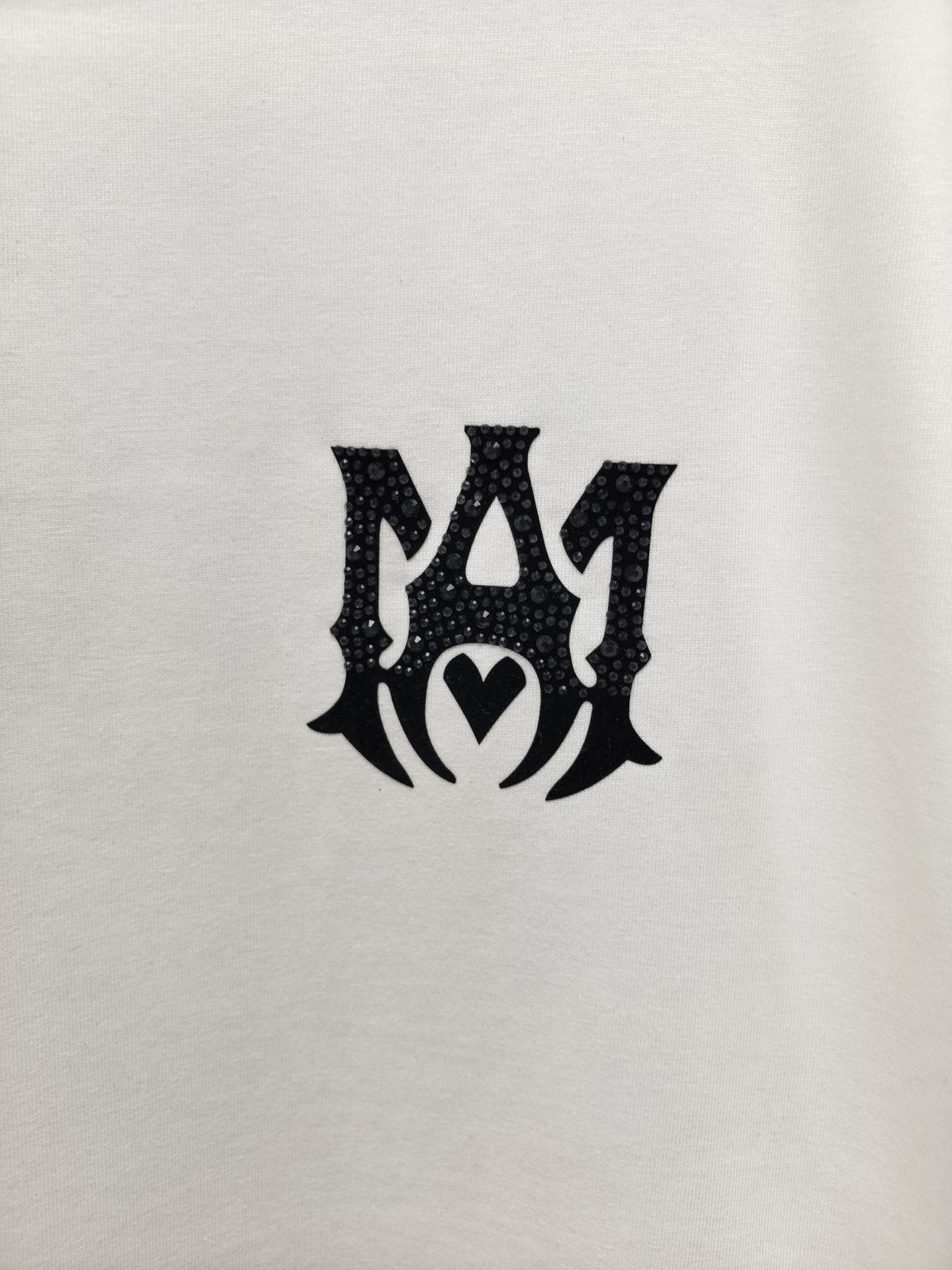 AMIRI Gothic Monogram Chest Graphic Crew Neck Short‑Sleeve T‑Shirt