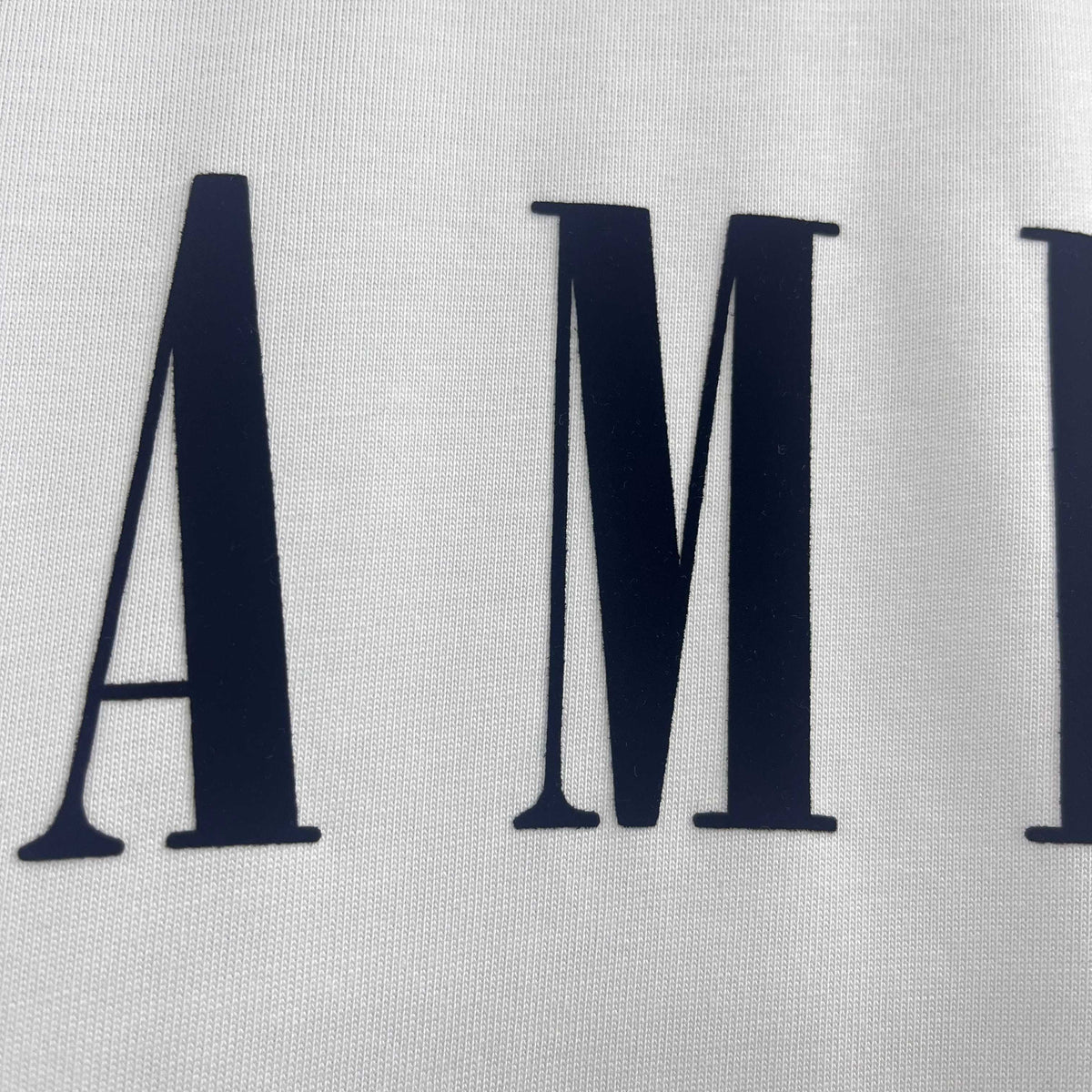 AMIRI Serif Core Logo Graphic Short‑Sleeve Tee