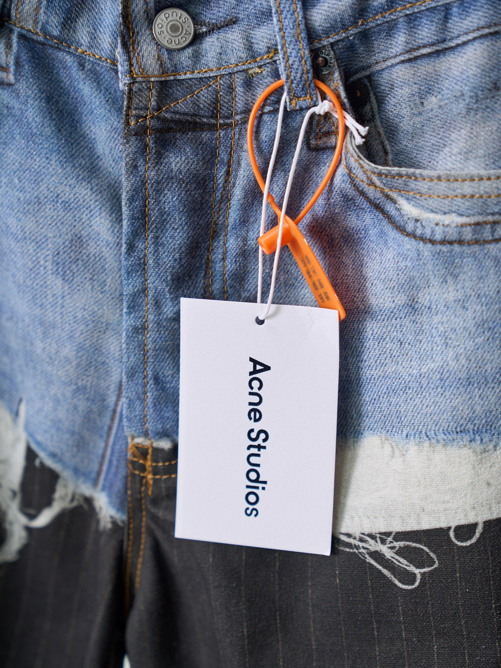 Acne Studios Spliced Deconstructed Wide‑Leg Denim Trousers