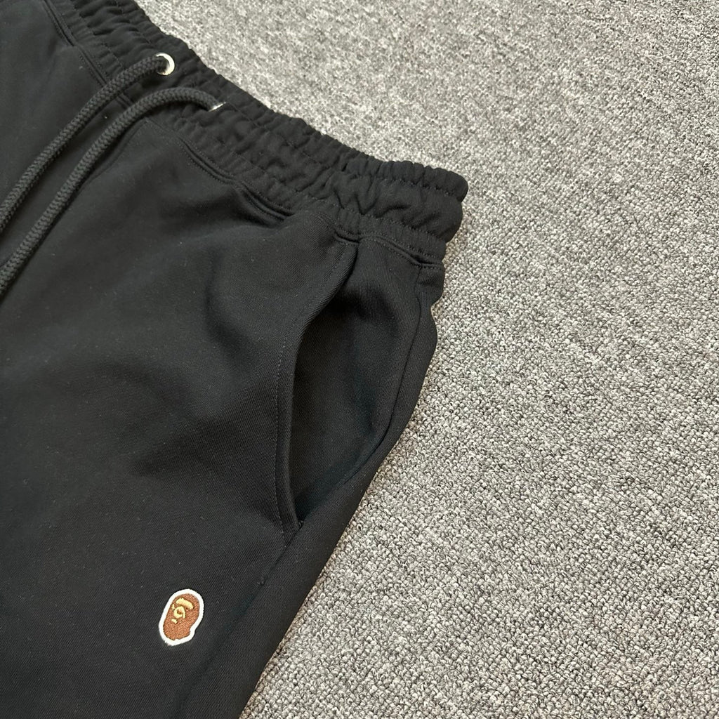 A Bathing Ape SS25 Gold Ape Head Woven Patch Shorts - Black