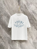 Amiri Arts District Multi‑Line Text Graphic Crew‑Neck Short‑Sleeve T‑Shirt