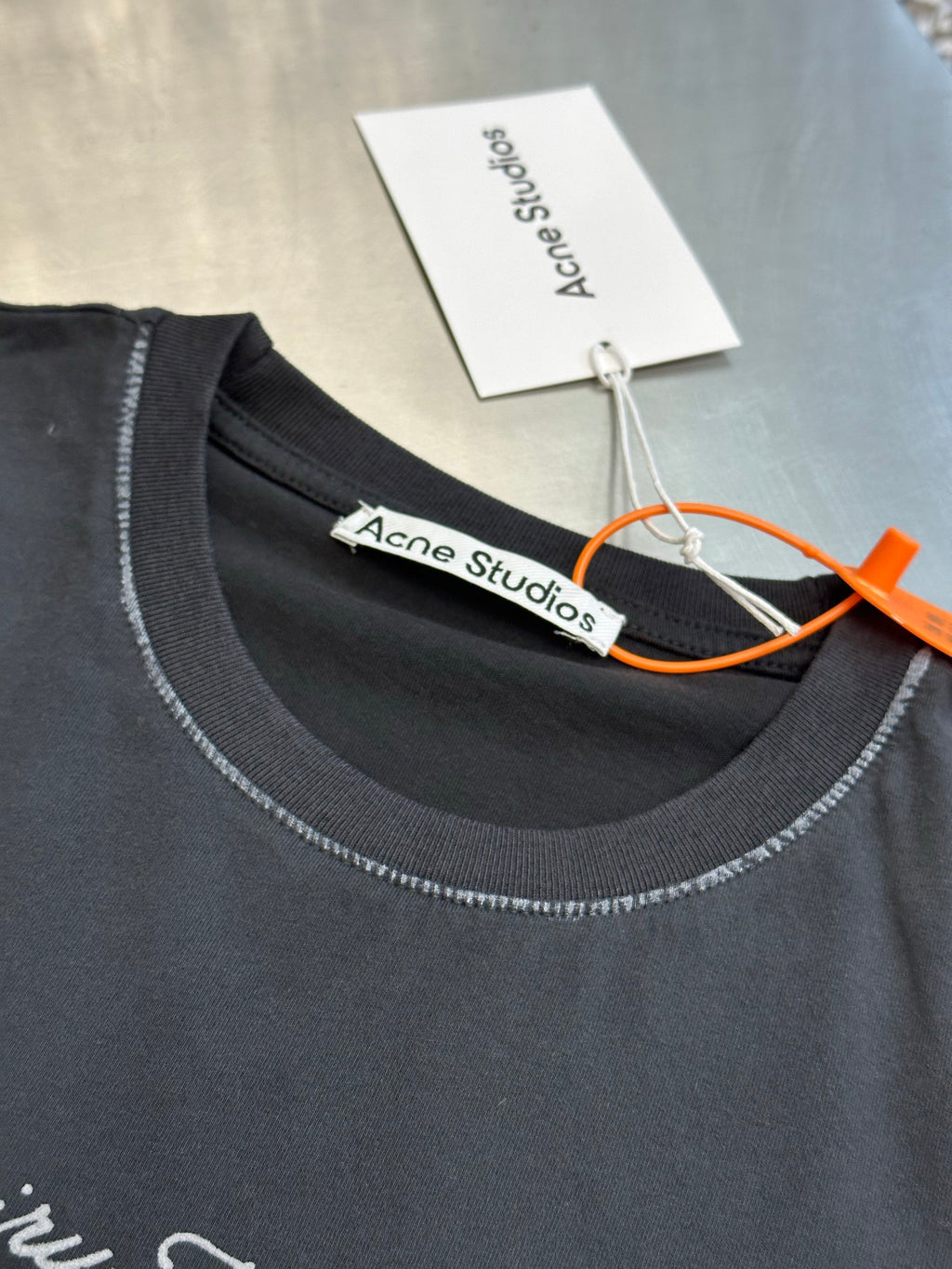 Acne Studios Retro Cursive Text Print Oversized Short‑Sleeve T‑Shirt