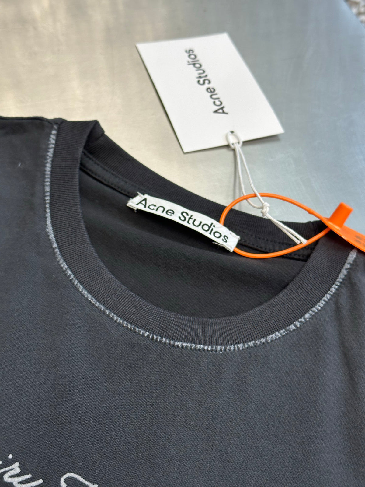 Acne Studios Retro Cursive Text Print Oversized Short‑Sleeve T‑Shirt