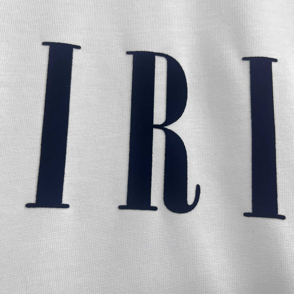 AMIRI Serif Core Logo Graphic Short‑Sleeve Tee