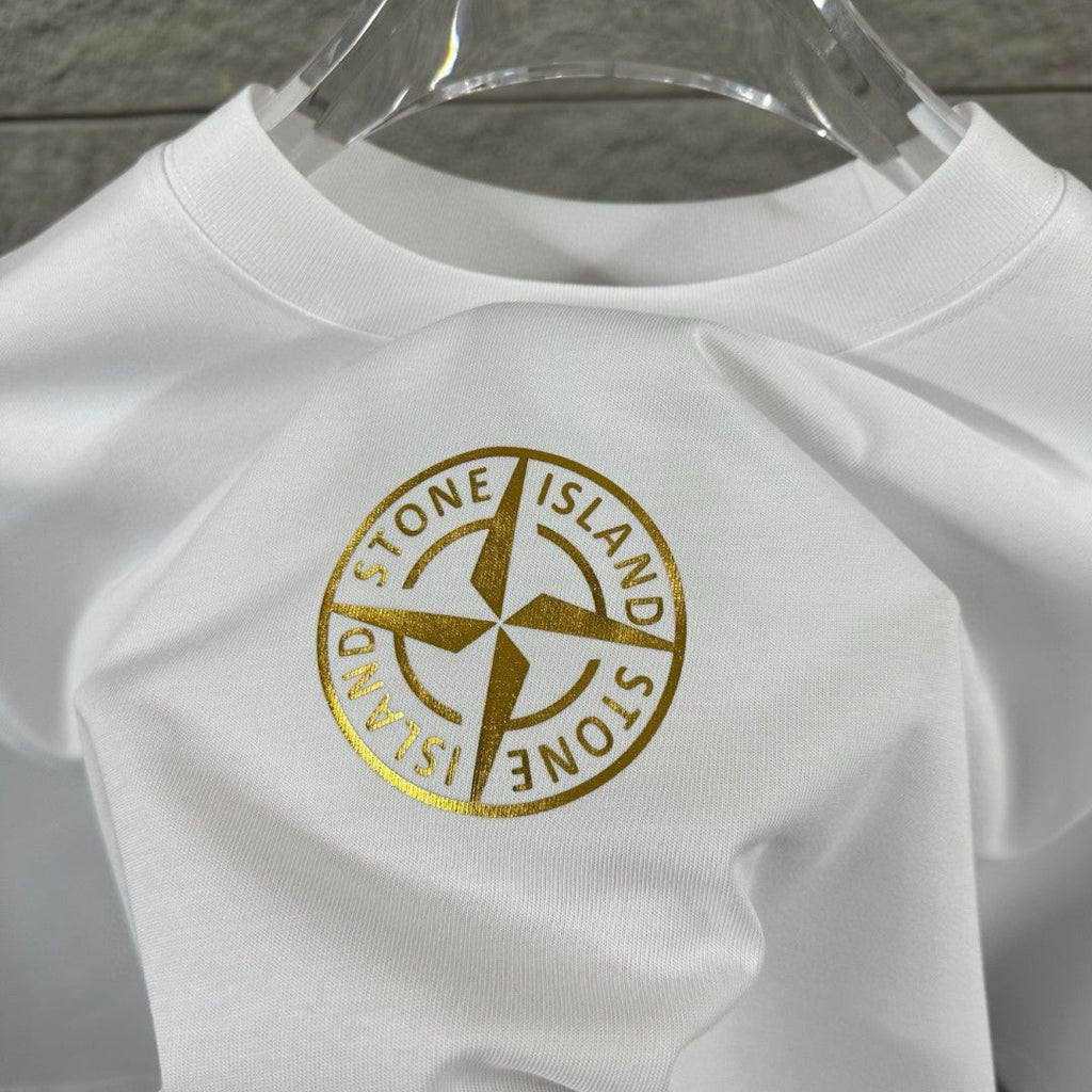 Stone Island Spring–Summer 2026 T-Shirt - Gold Foil Compass Badge at Centre Chest