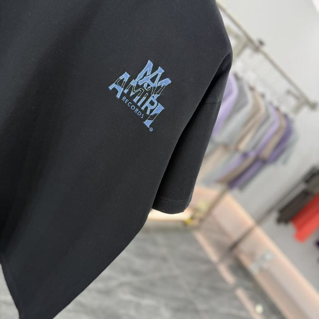 AMIRI Records Denim Patch Applique Back Graphic Crew Neck Short‑Sleeve T‑Shirt
