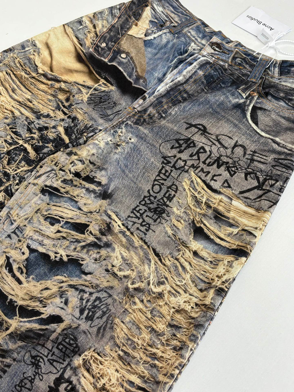 Acne Studios Graffiti‑Print Distressed Wide‑Leg Jeans