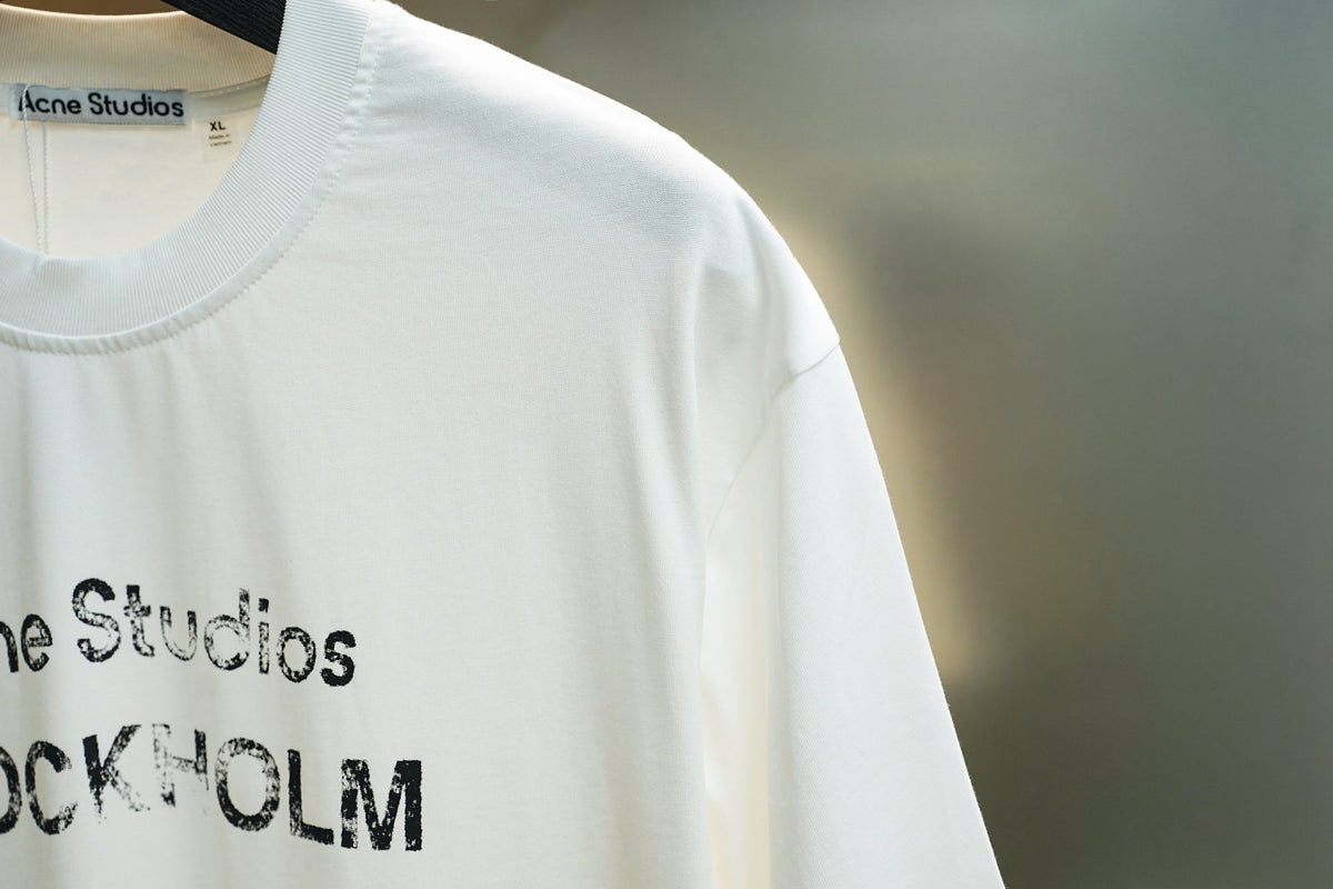Acne Studios Stockholm 1996 Distressed Text‑Print Crew‑Neck Short‑Sleeve T‑Shirt