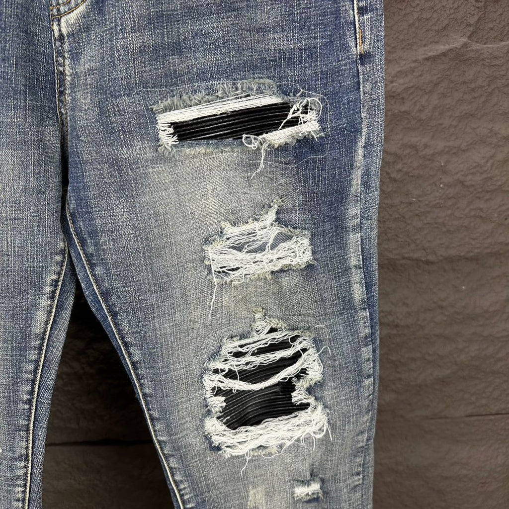 AMIRI Ripped Ribbed Patch Slim‑Fit Denim Jeans