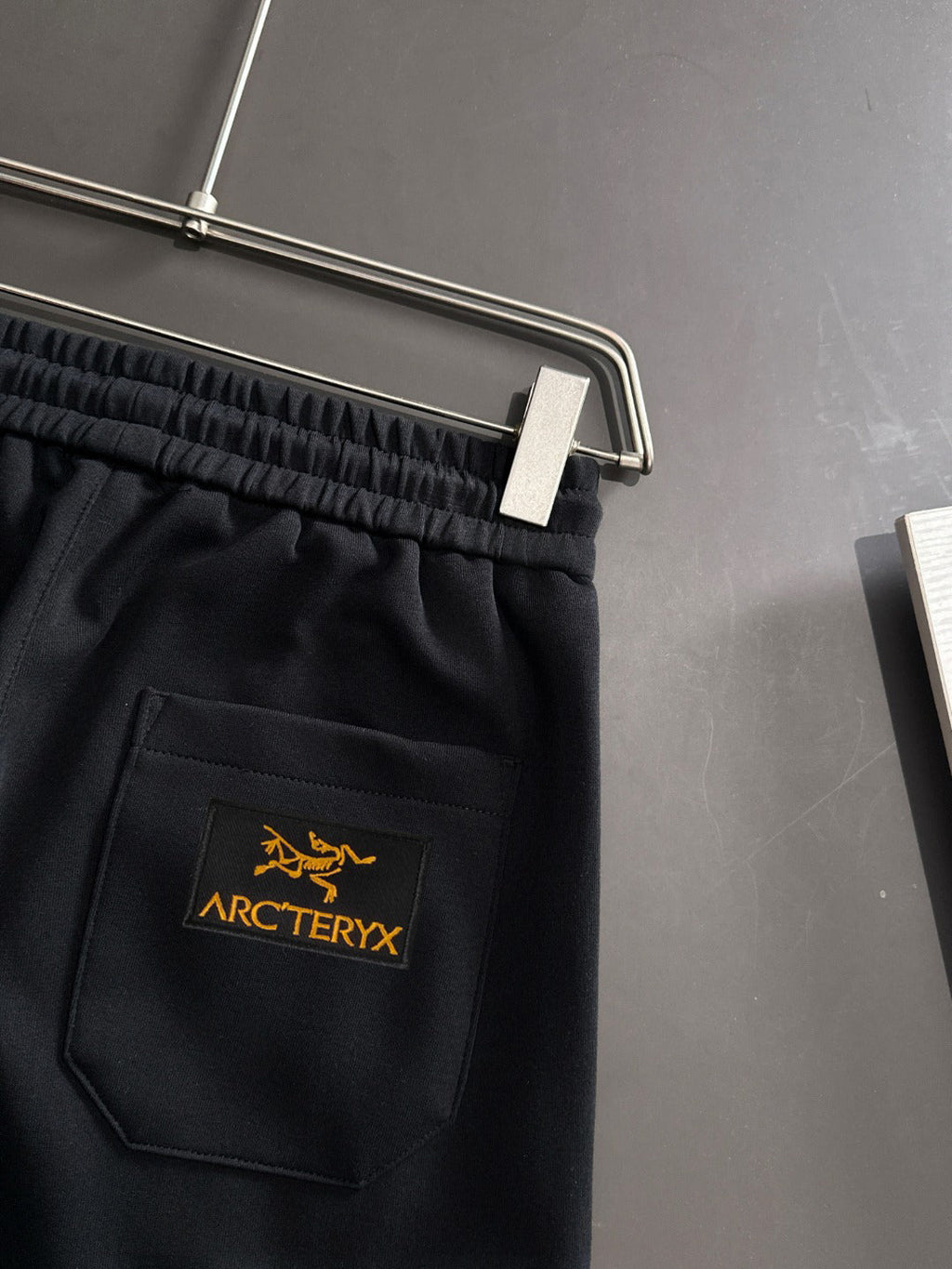 Arc'teryx Gold Bird Embroidered Elastic Waist Tapered Jogger Pants