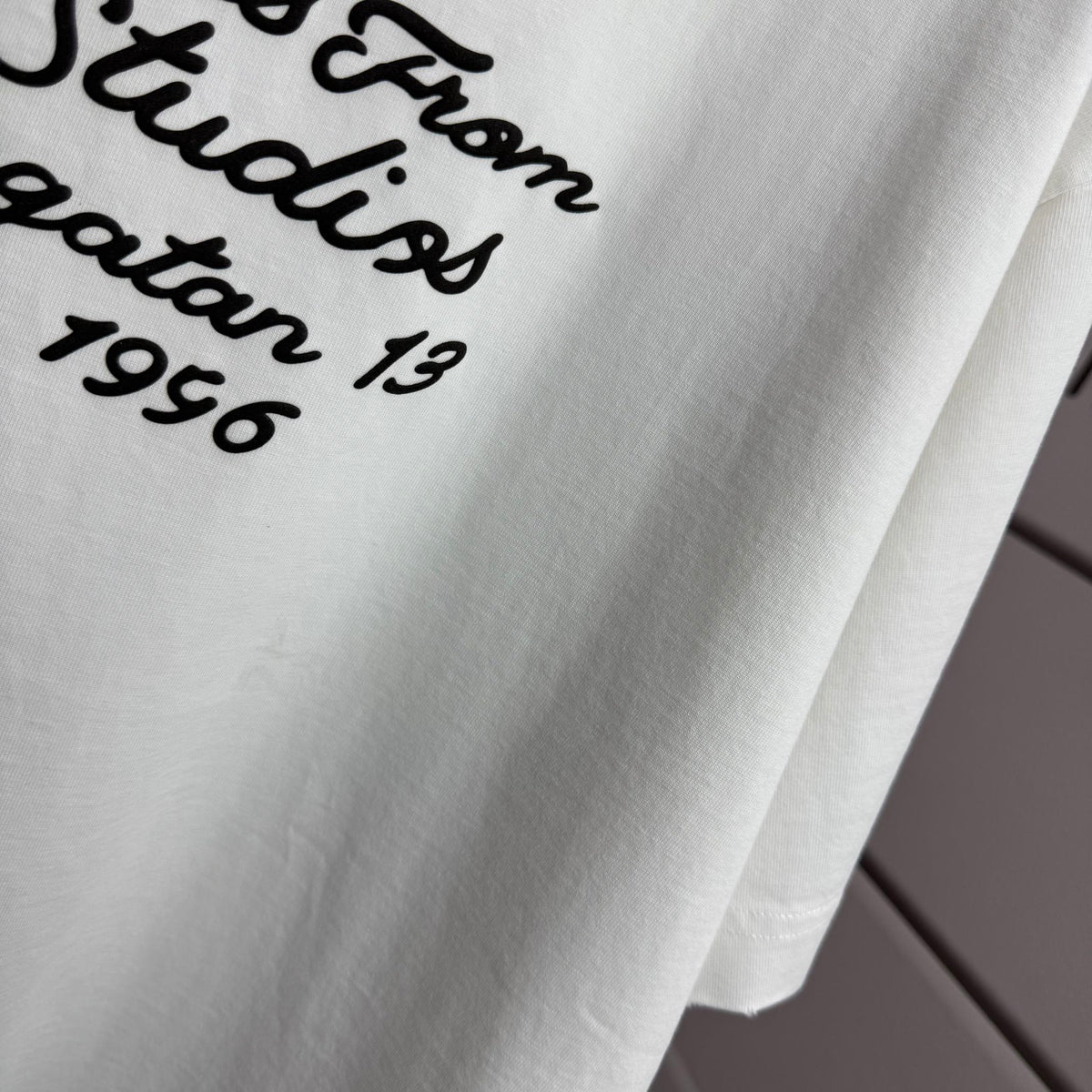 Acne Studios Fairy‑Tales Cursive‑Text Distressed‑Trim Crew‑Neck Short‑Sleeve T‑Shirt
