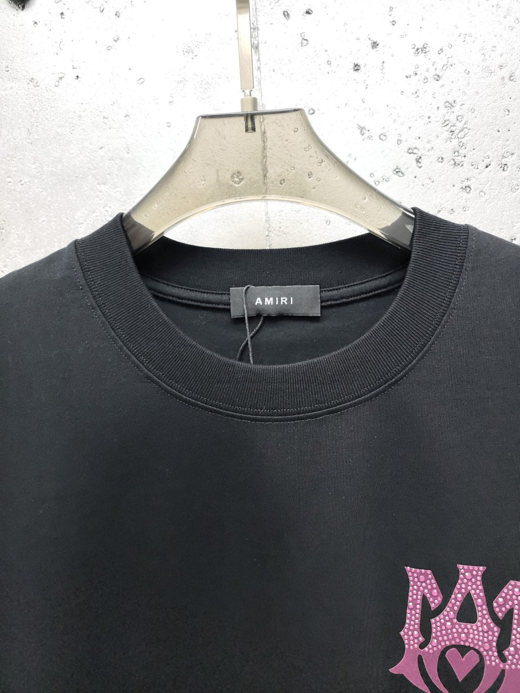 AMIRI Gothic Monogram Chest Graphic Crew Neck Short‑Sleeve T‑Shirt