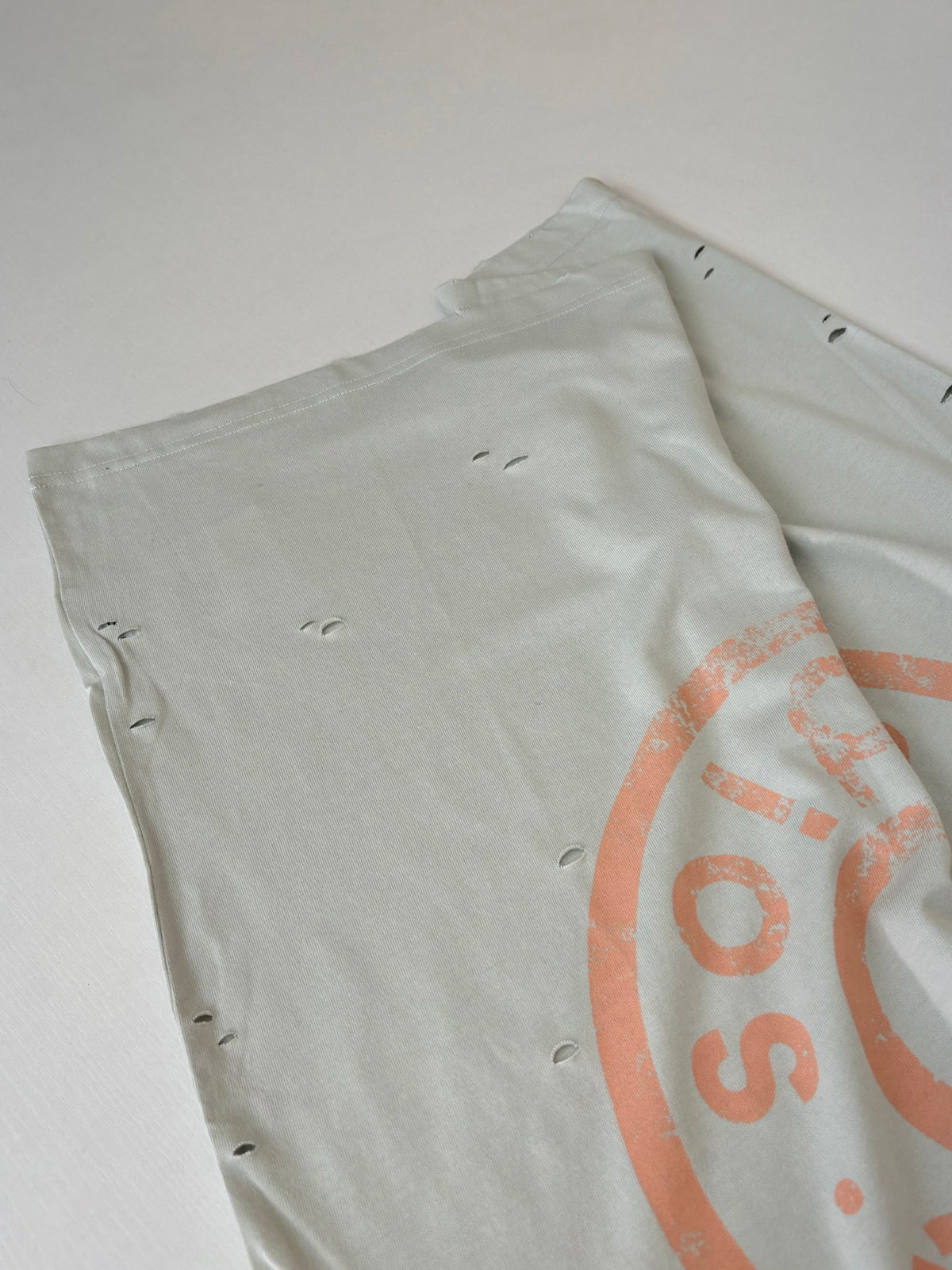 Acne Studios Distressed Circular‑Logo Oversized Short‑Sleeve T‑Shirt