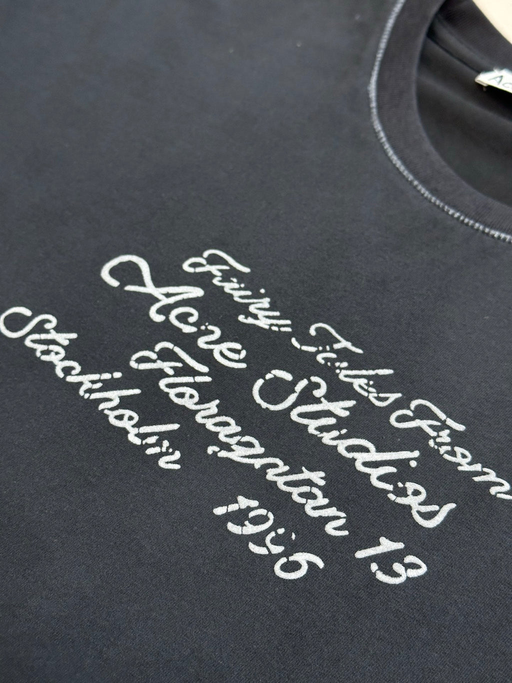 Acne Studios Retro Cursive Text Print Oversized Short‑Sleeve T‑Shirt