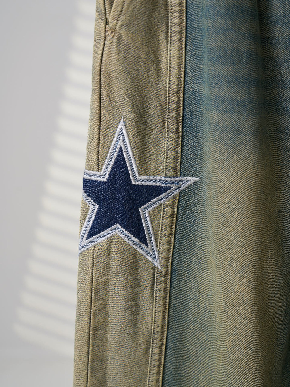 AMIRI Star‑Patch Paneled Drawstring Denim Pants