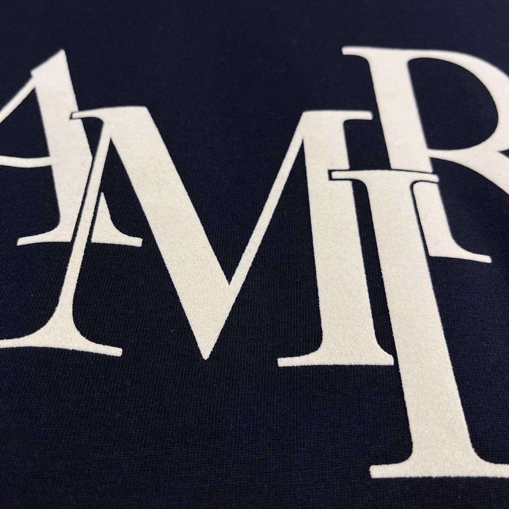 AMIRI Overlapping Stacked Letter Logo Crew Neck Short‑Sleeve T‑Shirt