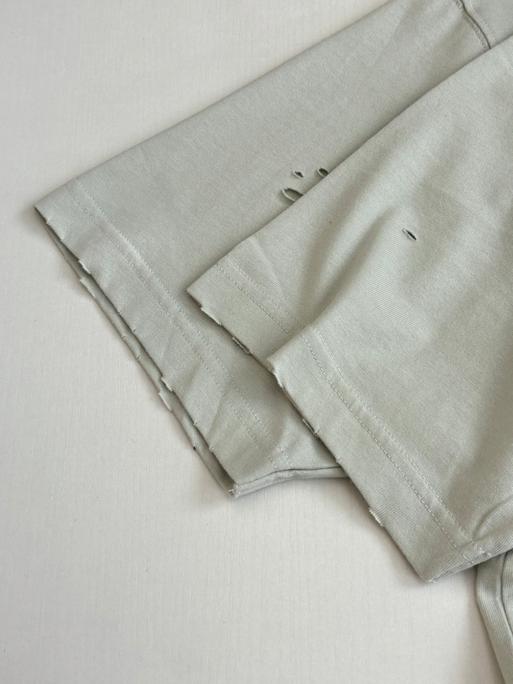 Acne Studios Distressed Circular‑Logo Oversized Short‑Sleeve T‑Shirt