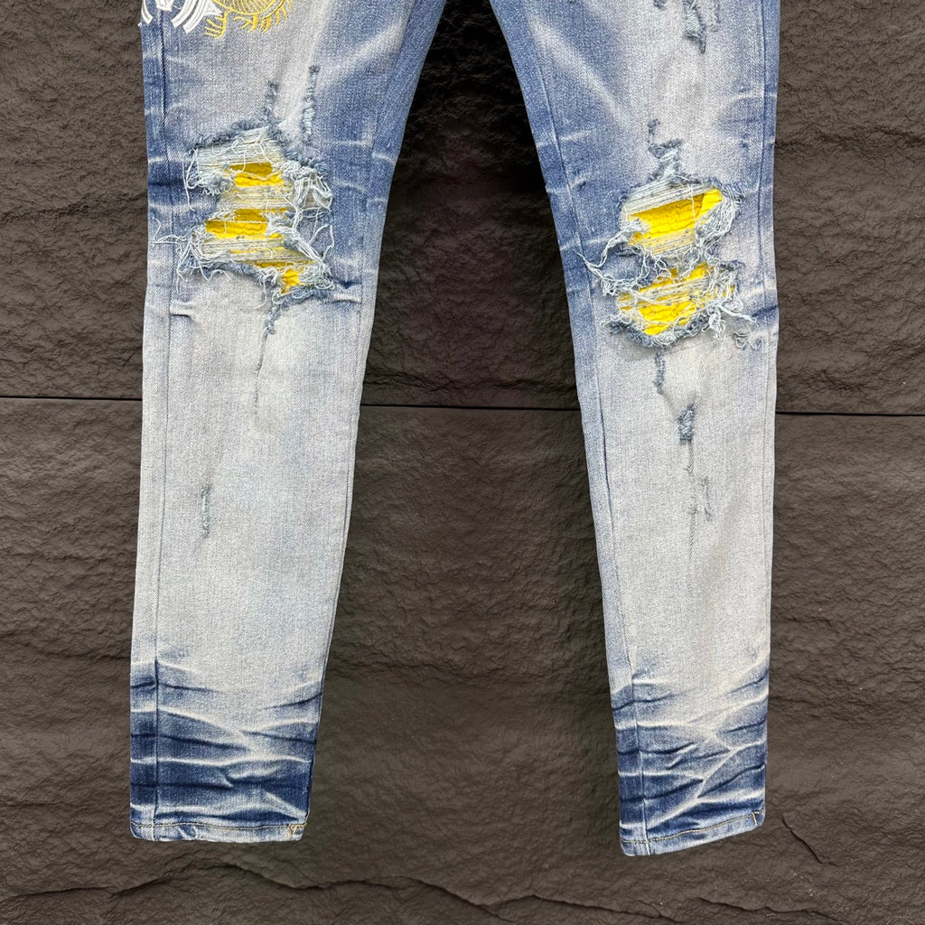 AMIRI Yellow Patch Distressed Printed Slim‑Fit Denim Jeans