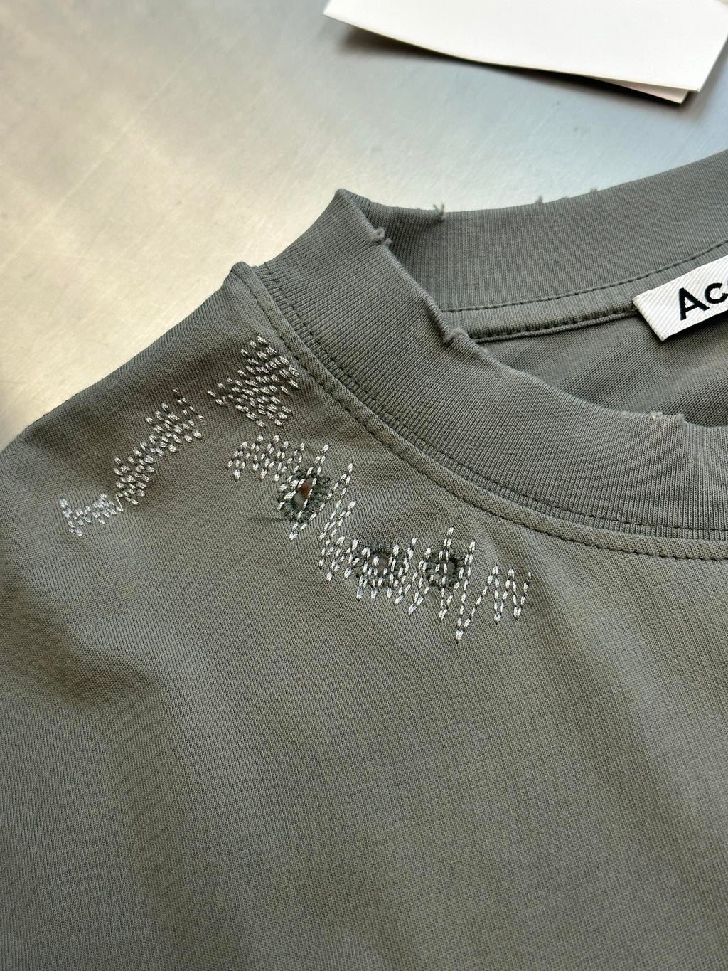 Acne Studios Distressed Oversized Short‑Sleeve T‑Shirt
