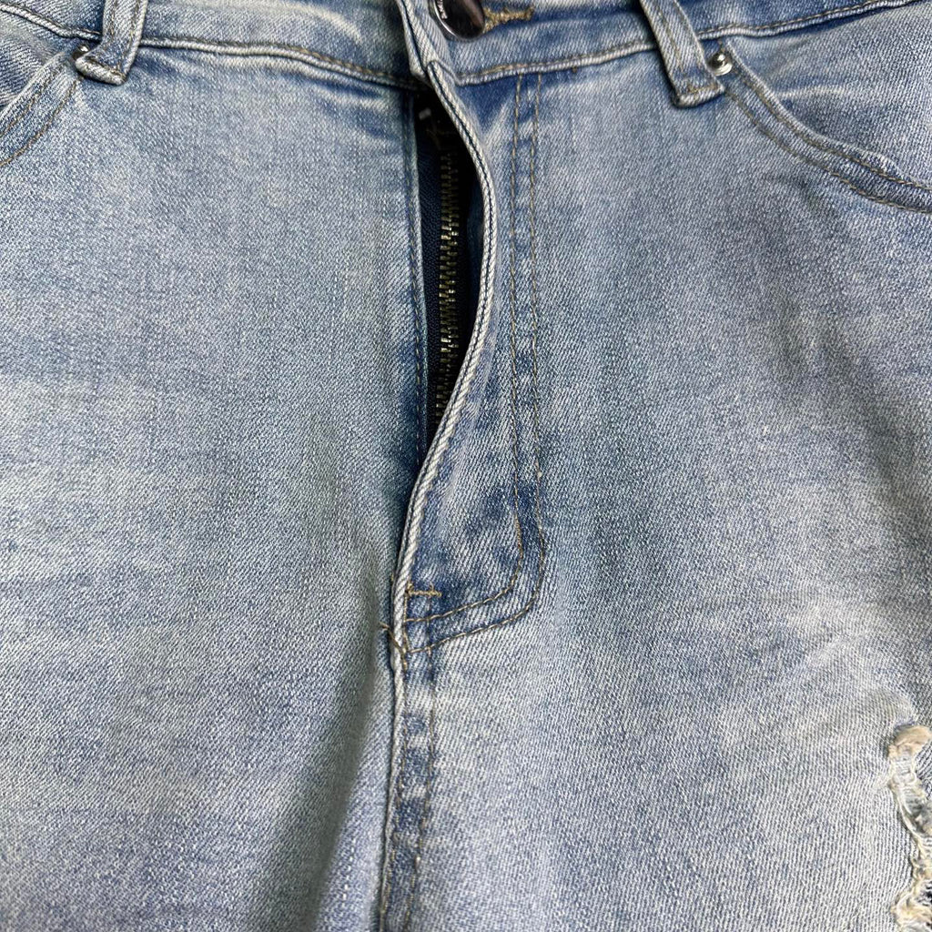 AMIRI Black Ribbed Patch Distressed Slim‑Fit Denim Jeans