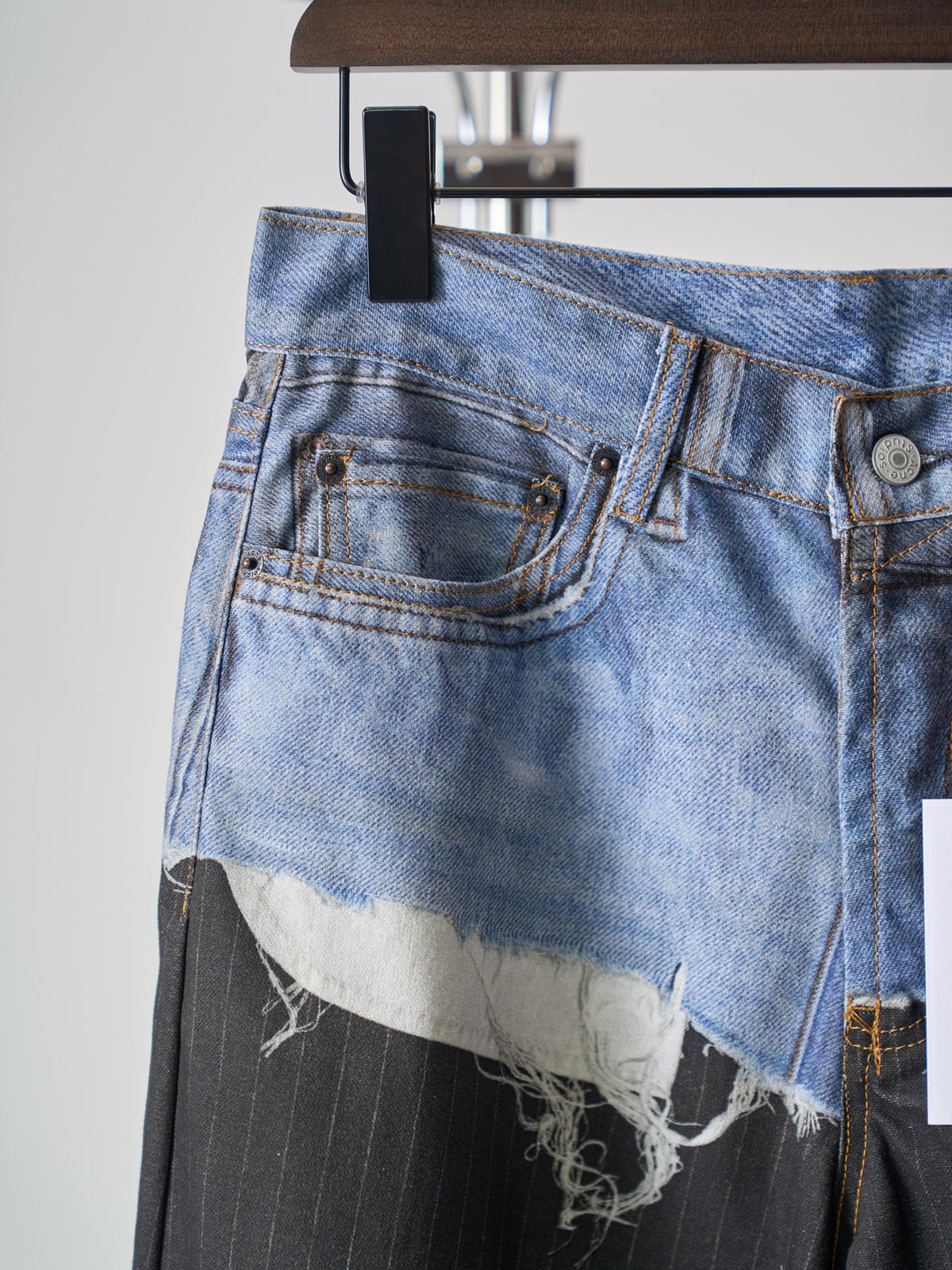 Acne Studios Spliced Deconstructed Wide‑Leg Denim Trousers