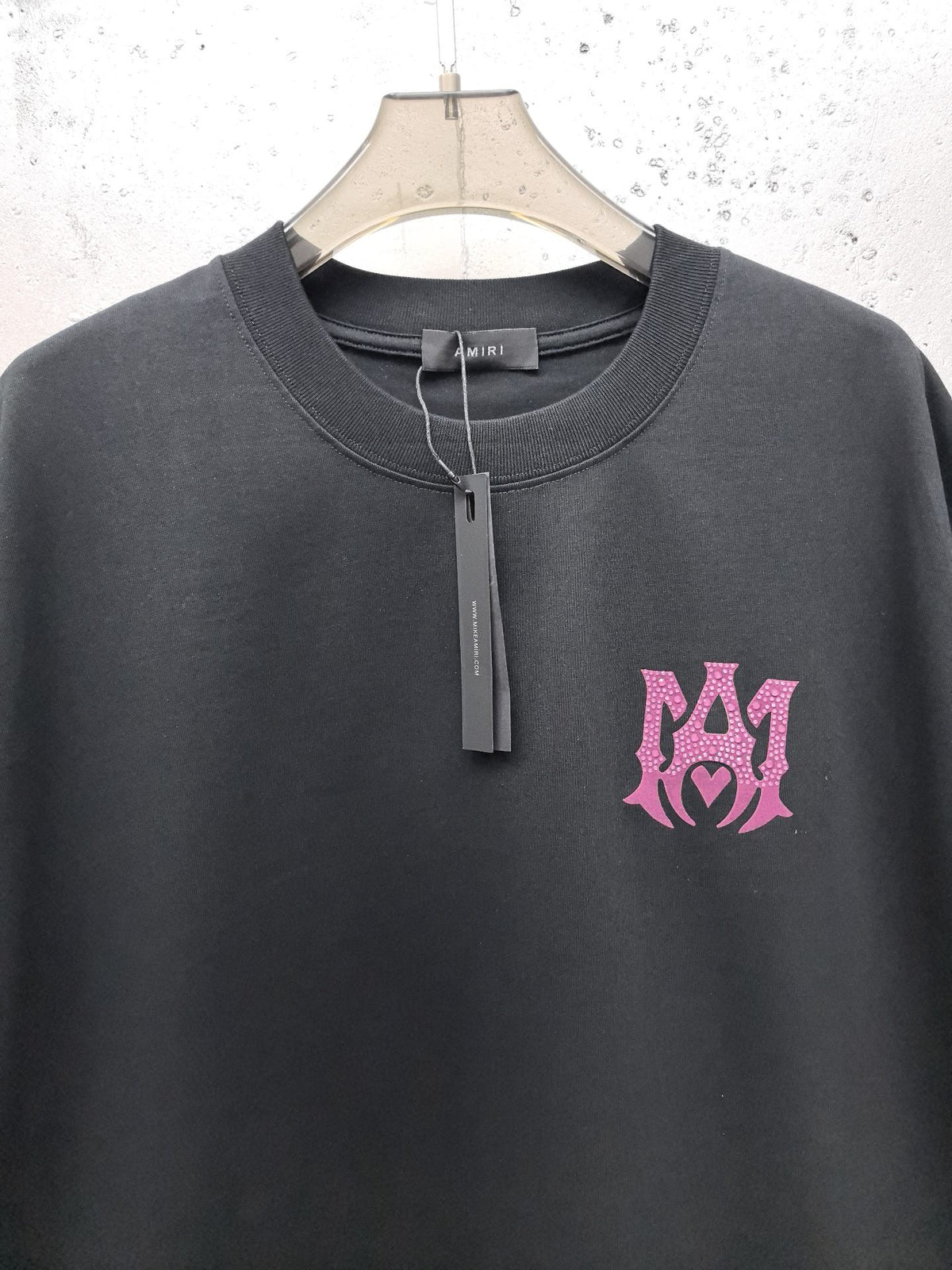 AMIRI Gothic Monogram Chest Graphic Crew Neck Short‑Sleeve T‑Shirt