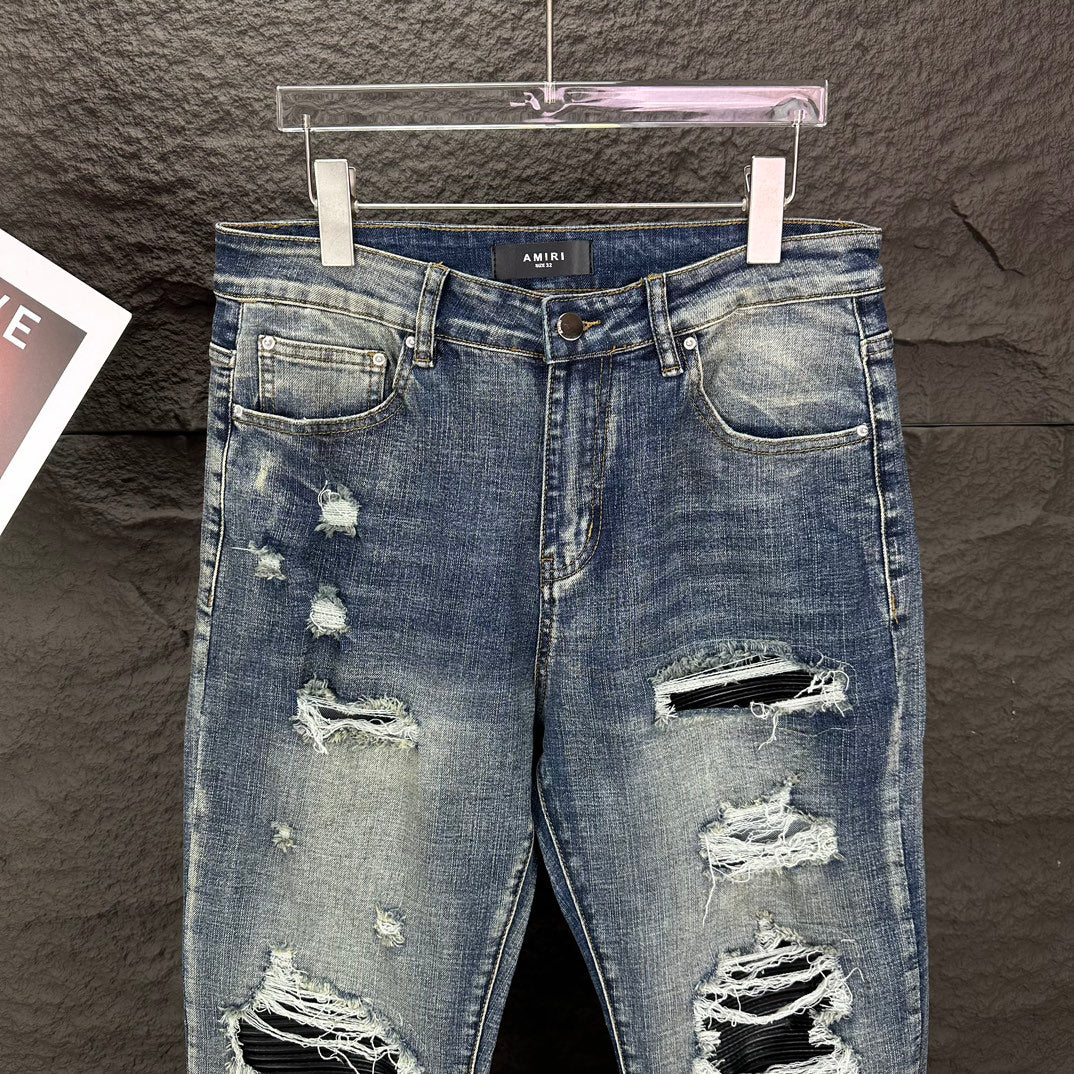 AMIRI Ripped Ribbed Patch Slim‑Fit Denim Jeans