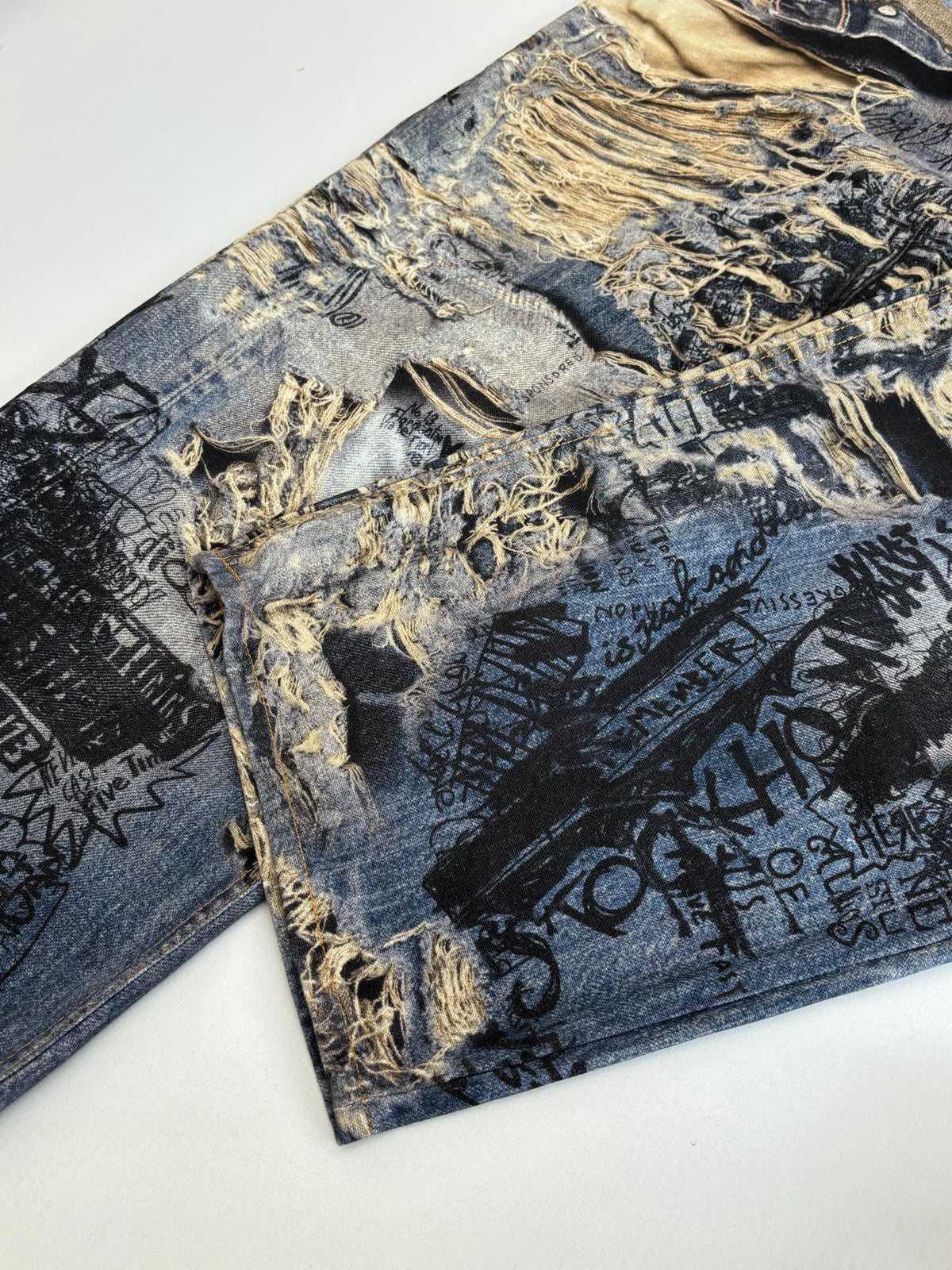 Acne Studios Graffiti‑Print Distressed Wide‑Leg Jeans