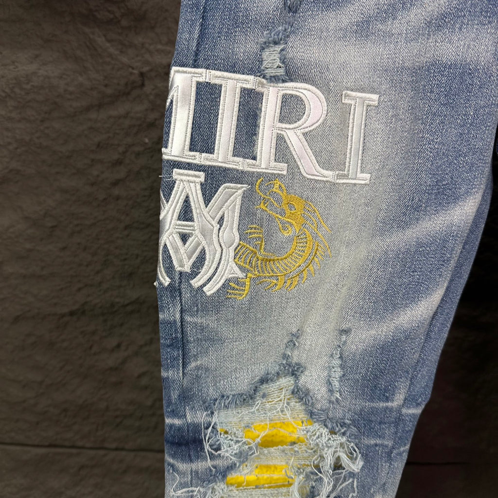 AMIRI Yellow Patch Distressed Printed Slim‑Fit Denim Jeans