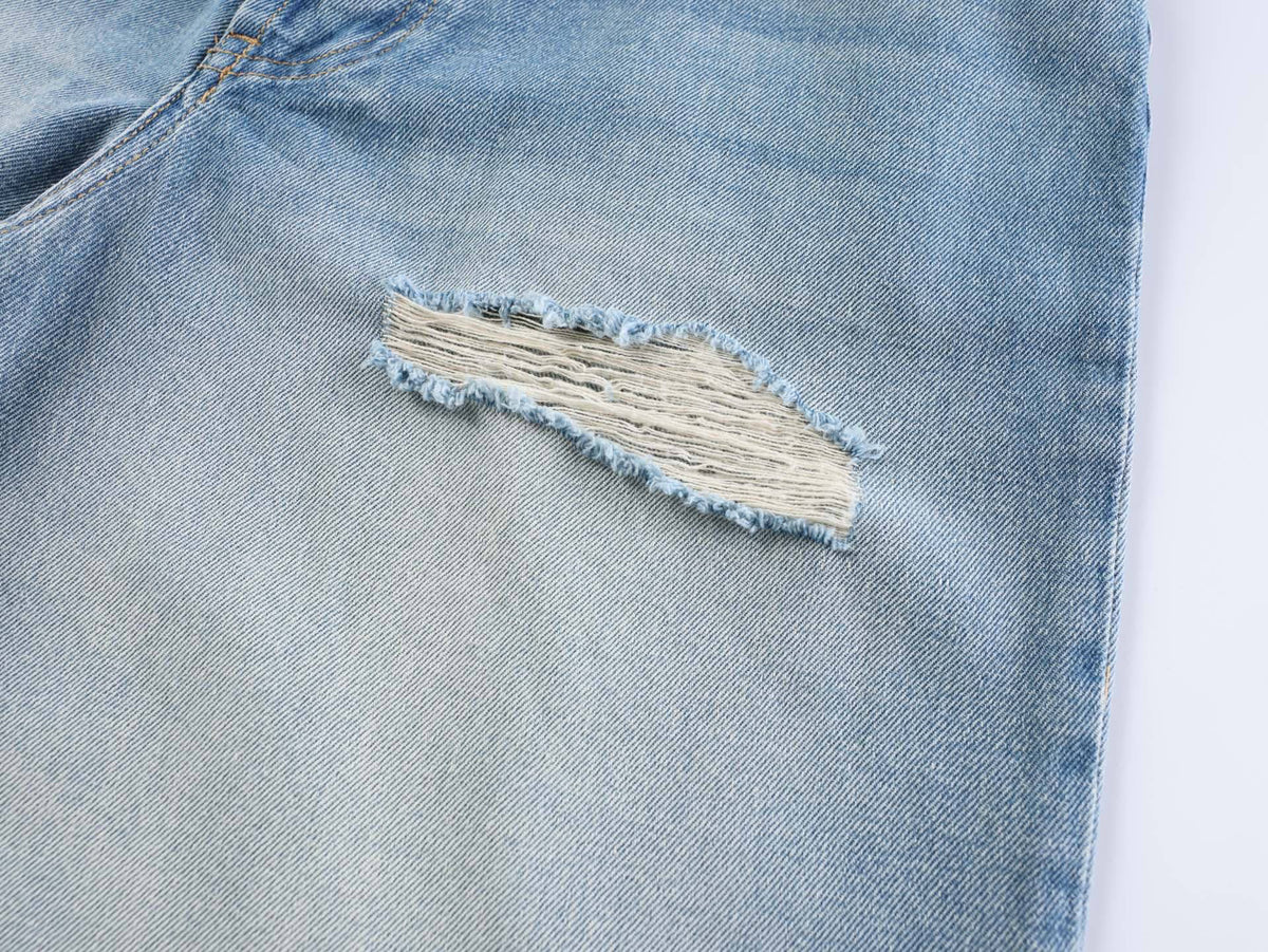 Acne Studios Heavy‑Ripped Distressed Washed Denim Wide‑Leg Jort Shorts