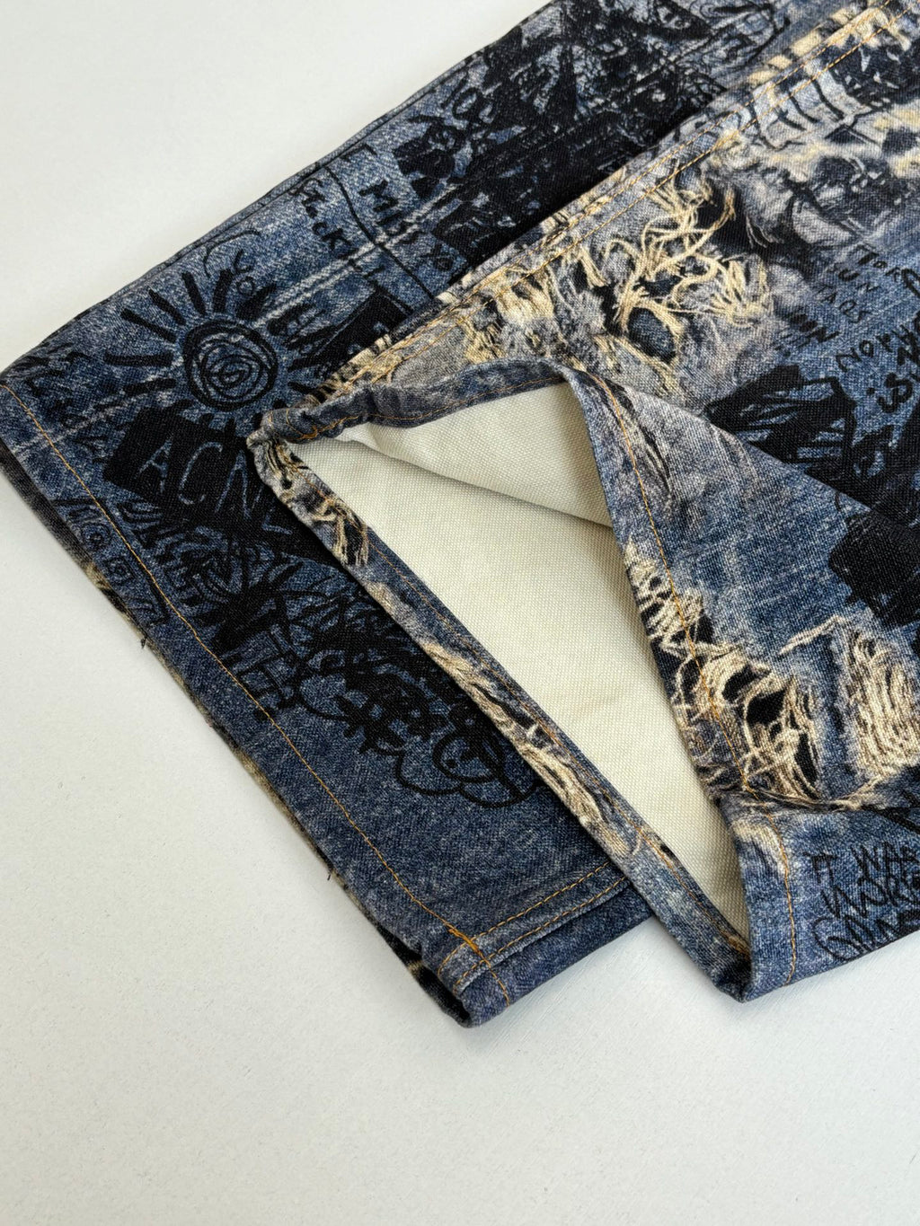 Acne Studios Graffiti‑Print Distressed Wide‑Leg Jeans