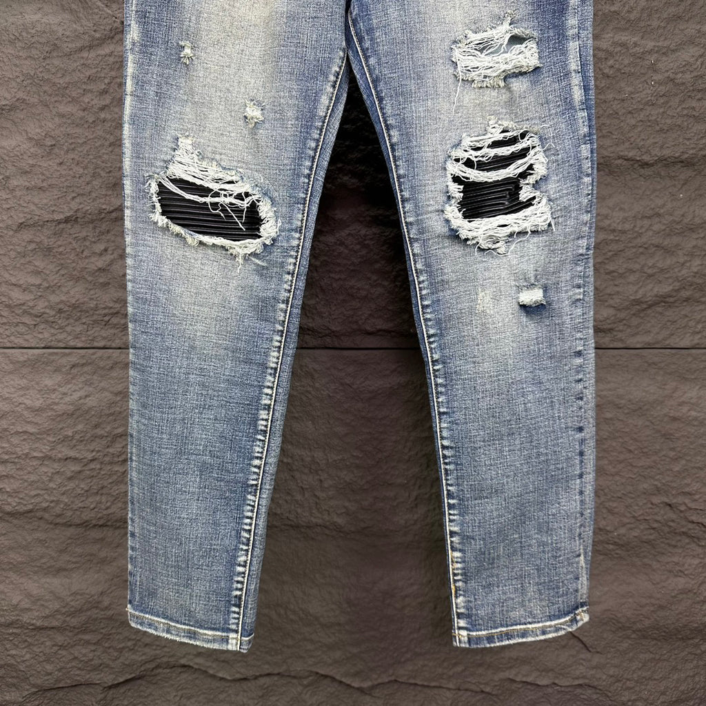AMIRI Ripped Ribbed Patch Slim‑Fit Denim Jeans