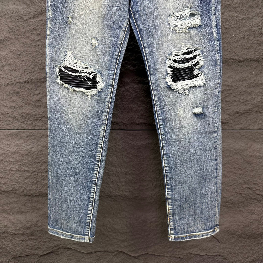 AMIRI Ripped Ribbed Patch Slim‑Fit Denim Jeans