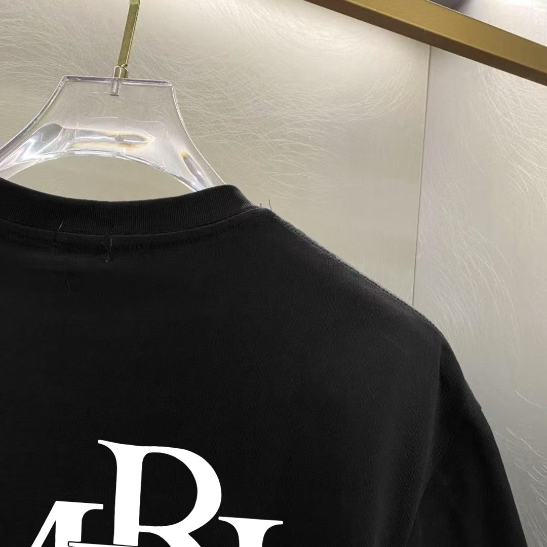 Amiri Interlocking Monogram Chest Graphic Crew‑Neck Short‑Sleeve T‑Shirt