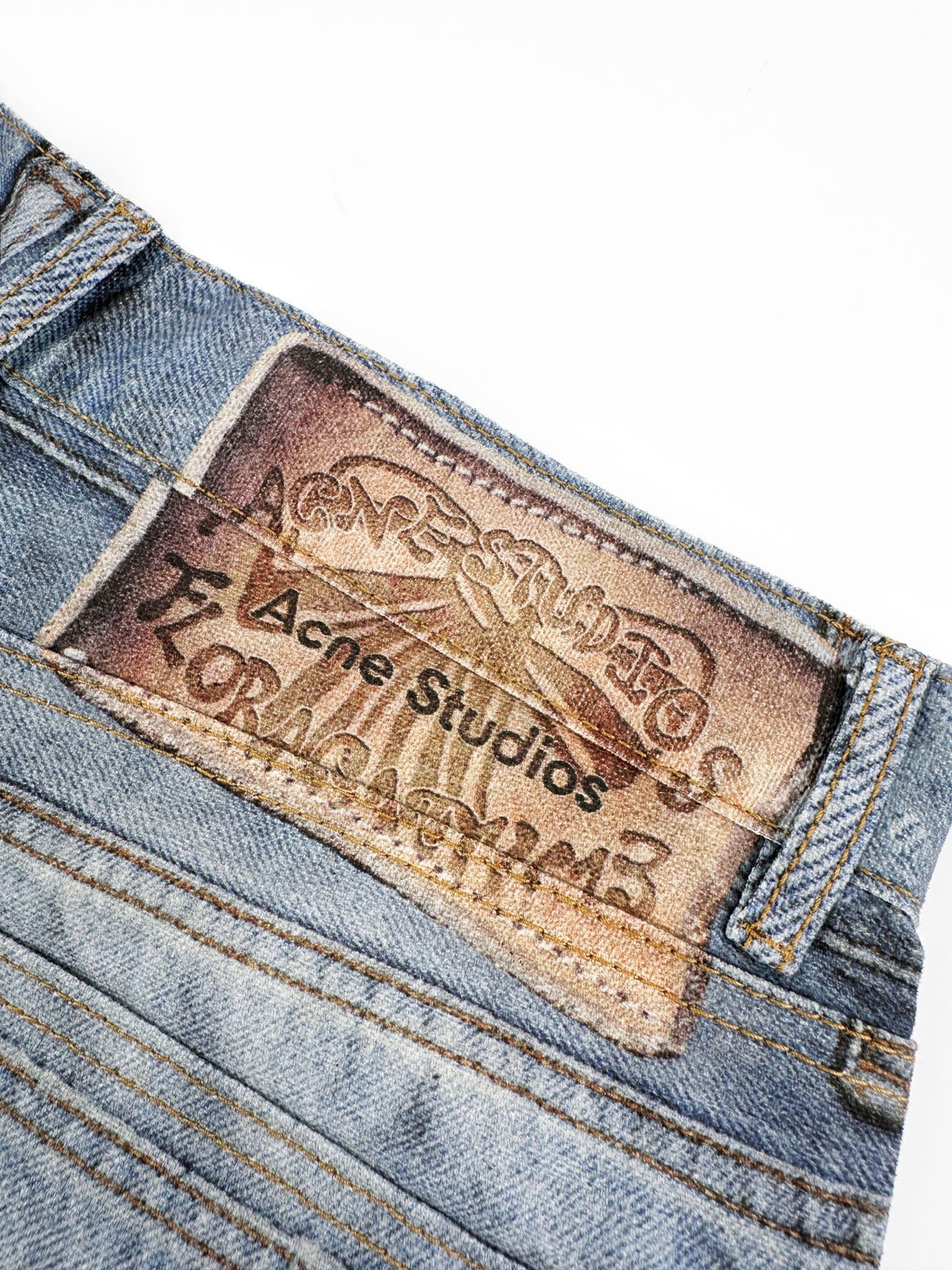 Acne Studios Patchwork Distressed Wide‑Leg Jeans