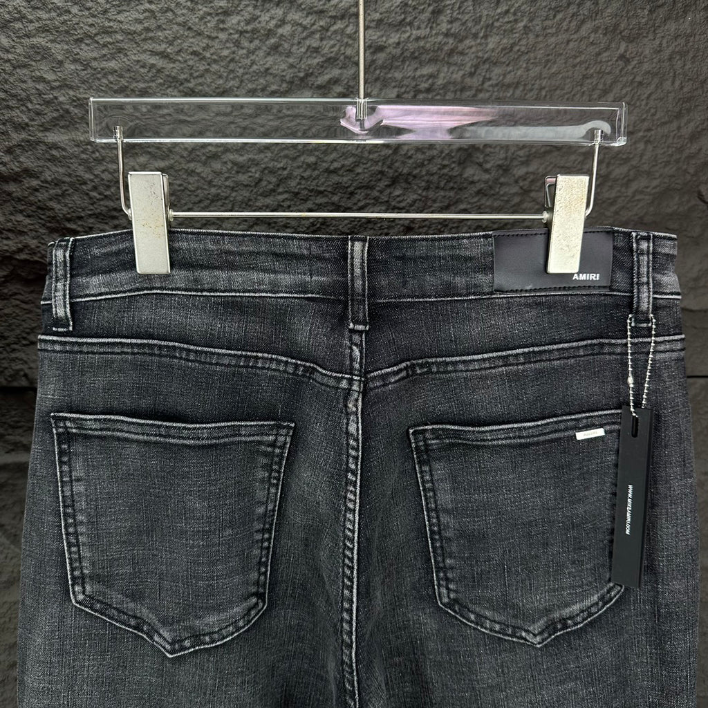 AMIRI Studded Multi‑Rip Distressed Slim‑Fit Denim Jeans