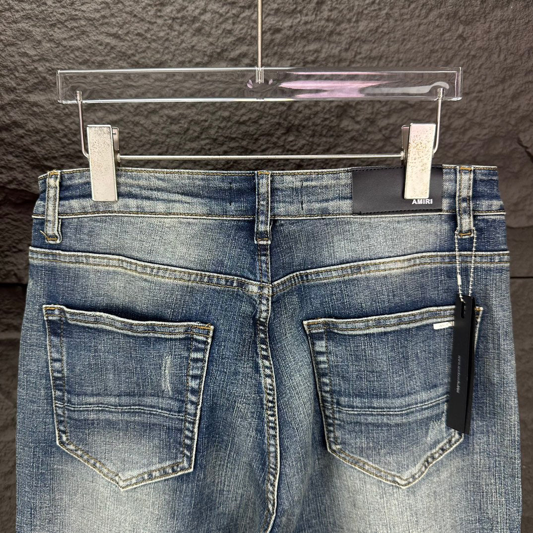 AMIRI Ripped Ribbed Patch Slim‑Fit Denim Jeans