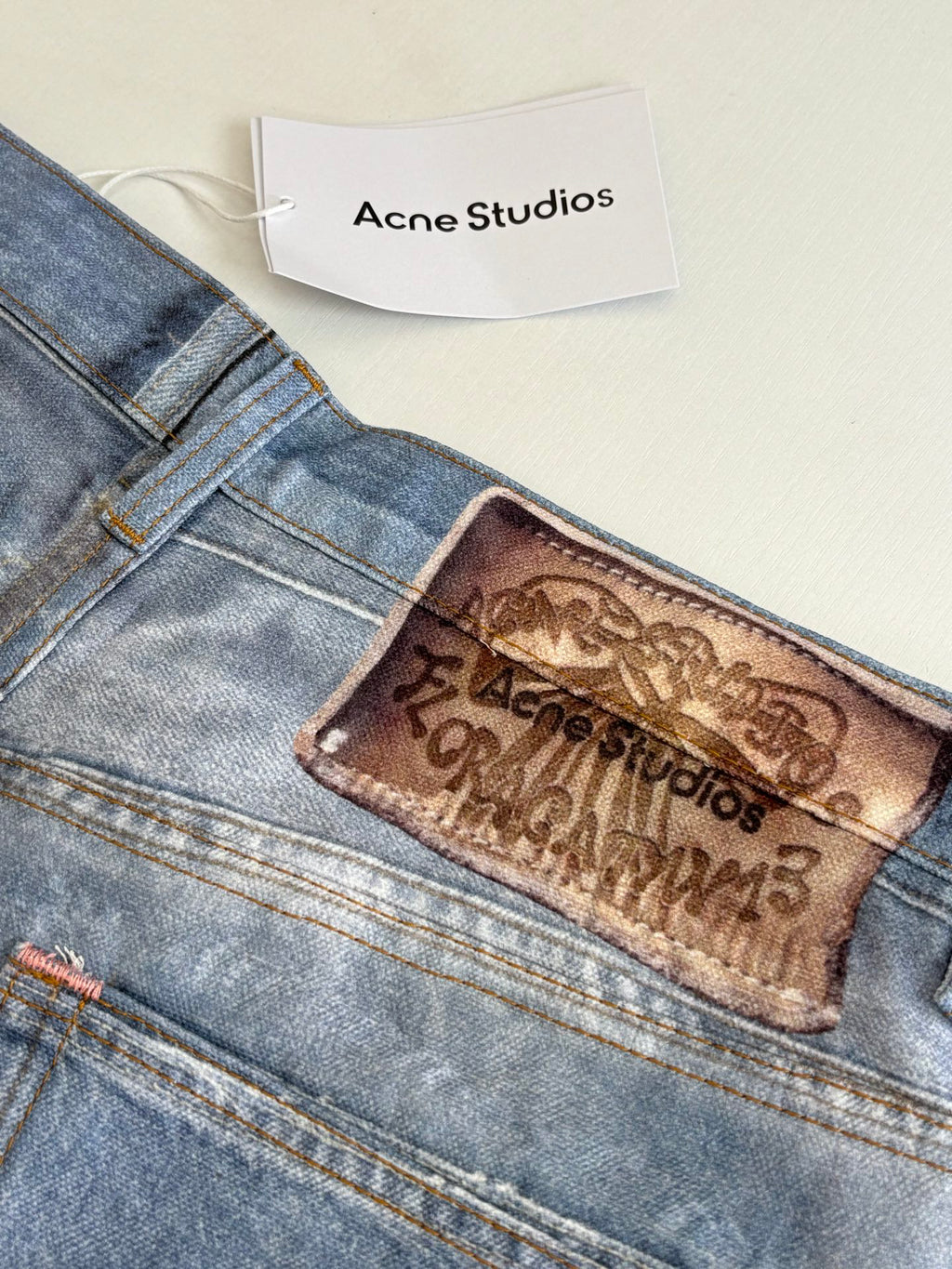 Acne Studios Heavily Distressed Denim Jort Shorts