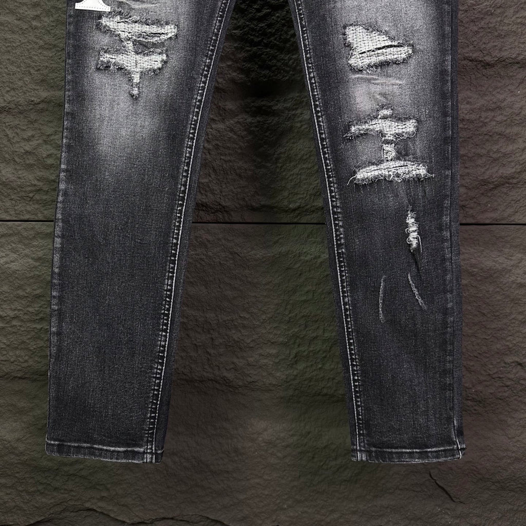 AMIRI Logo‑Print Multi‑Rip Distressed Slim‑Fit Denim Jeans