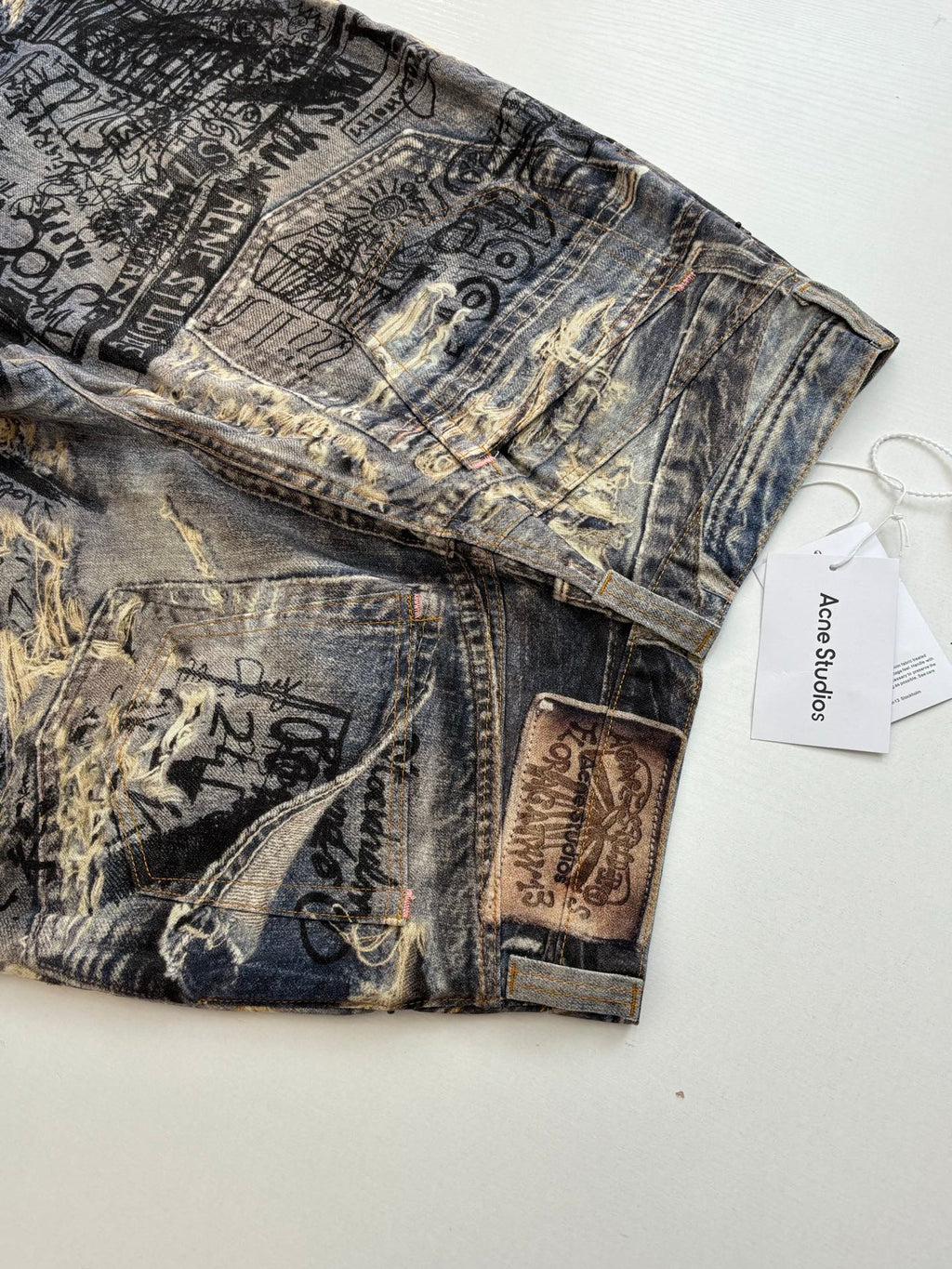 Acne Studios Graffiti‑Print Distressed Wide‑Leg Jeans