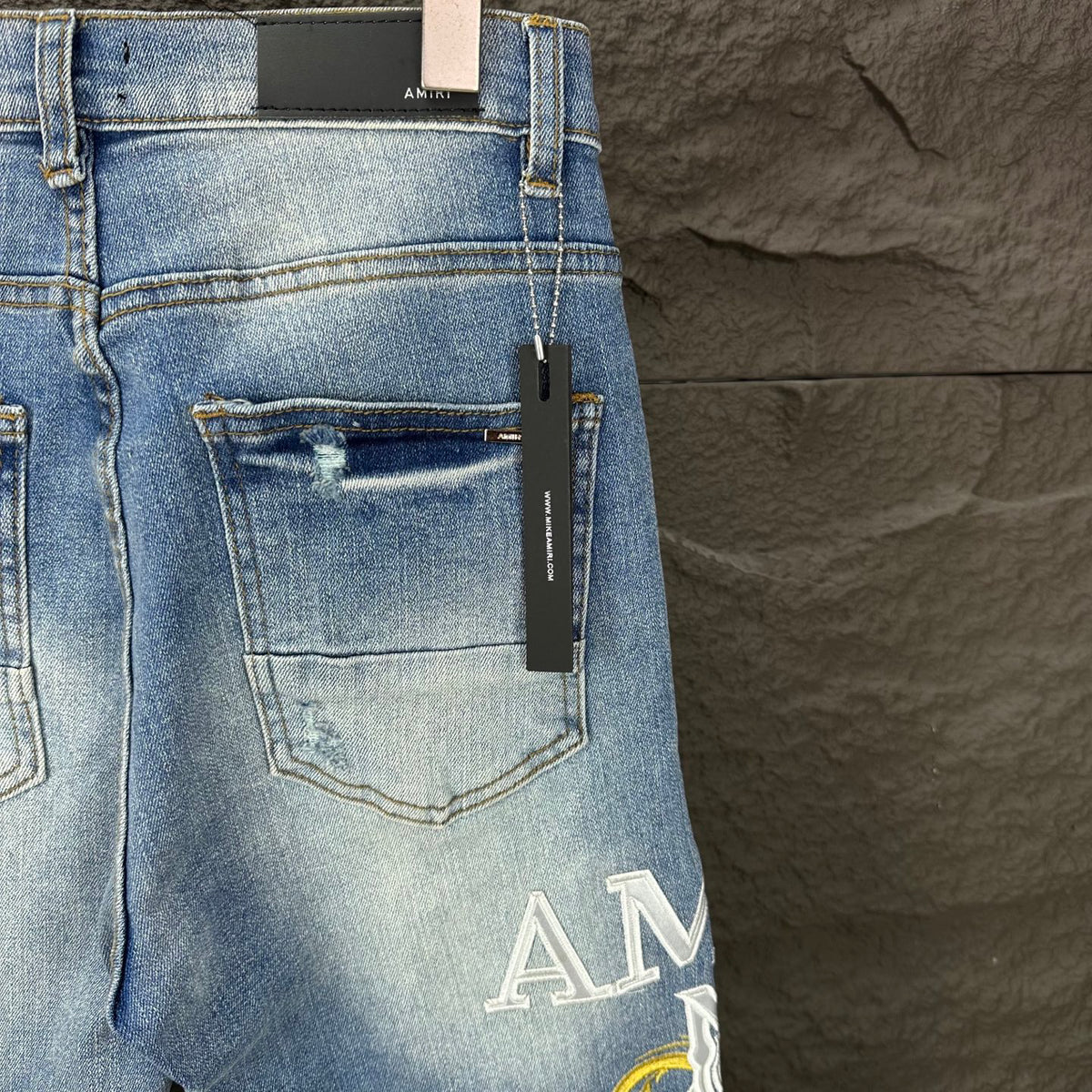 AMIRI Yellow Patch Distressed Printed Slim‑Fit Denim Jeans