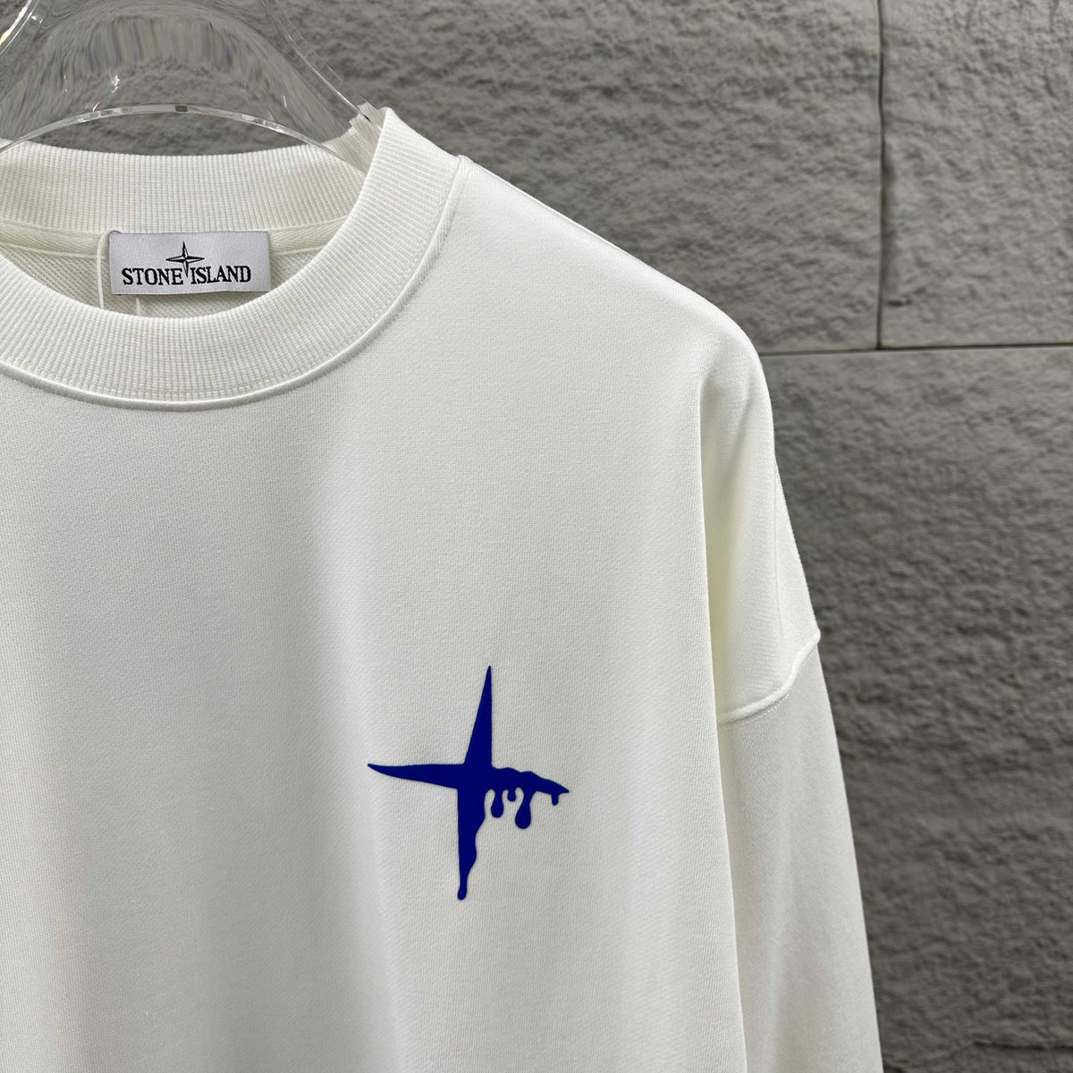 Stone Island Early Autumn–Winter 2026 Sweatshirt — Dripping Compass Star Flocked Logo at Left Chest, Dripping Compass Badge at Centre Back