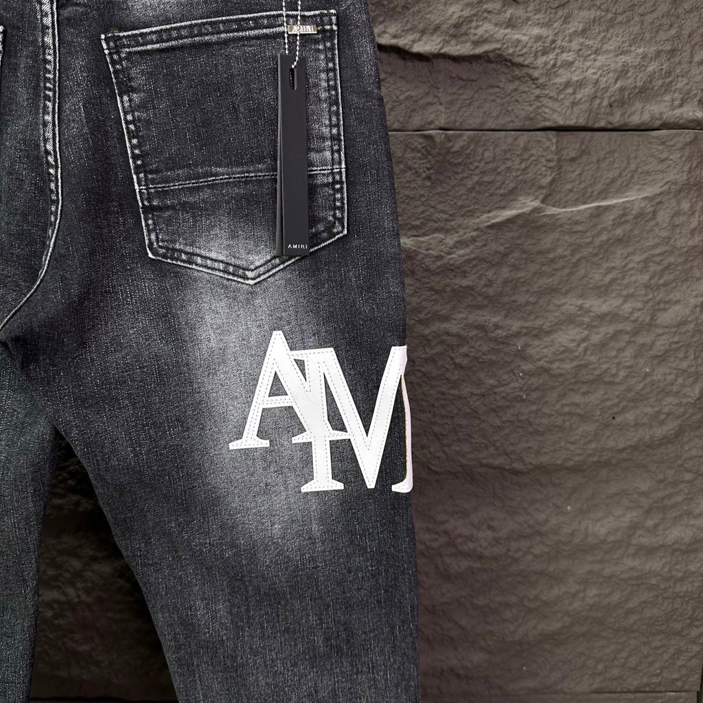 AMIRI Logo‑Print Multi‑Rip Distressed Slim‑Fit Denim Jeans