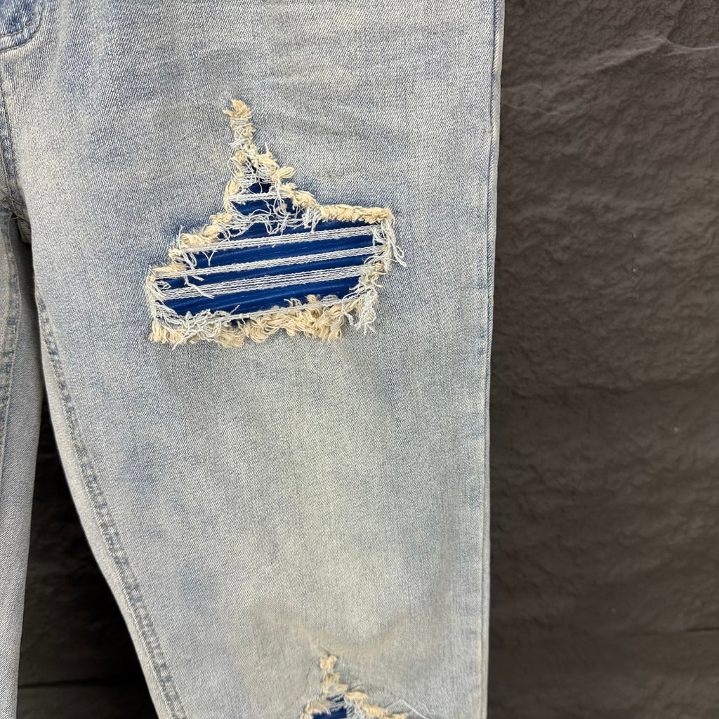 AMIRI Blue Ribbed Patch Diamond‑Rip Distressed Slim‑Fit Denim Jeans