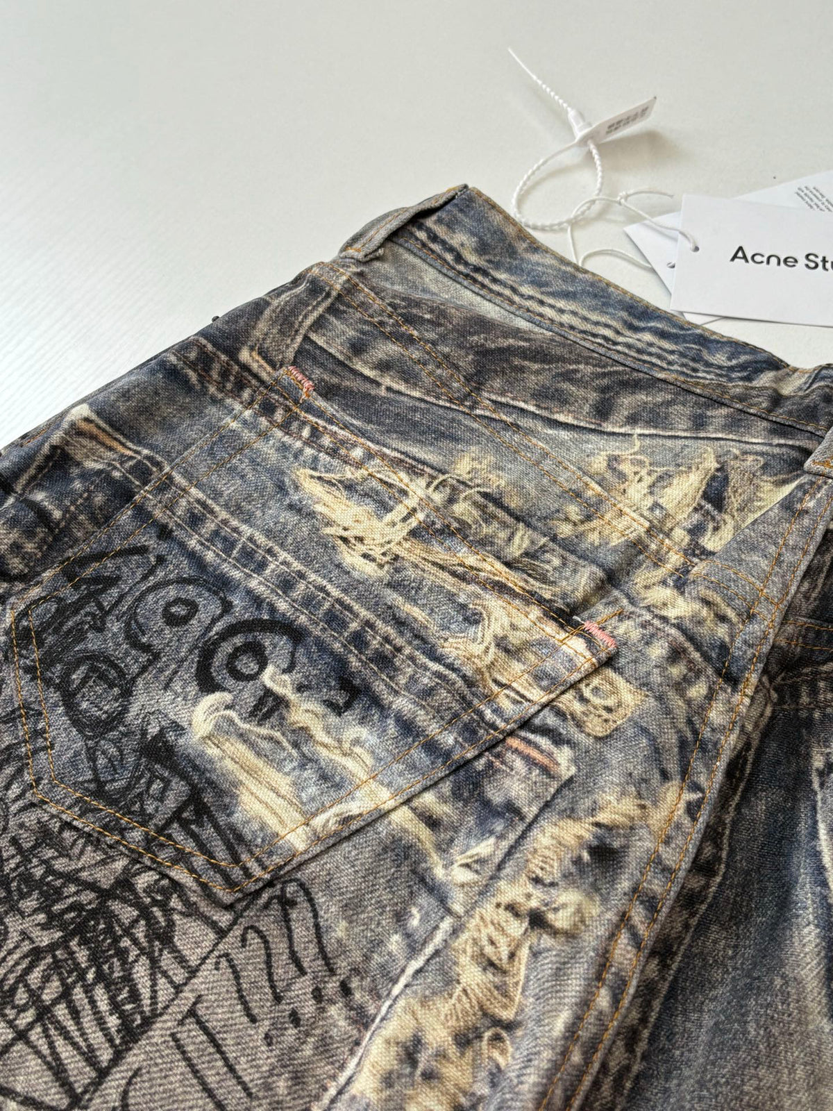 Acne Studios Graffiti‑Print Distressed Wide‑Leg Jeans